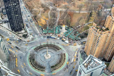 a view of a living room and a balcony