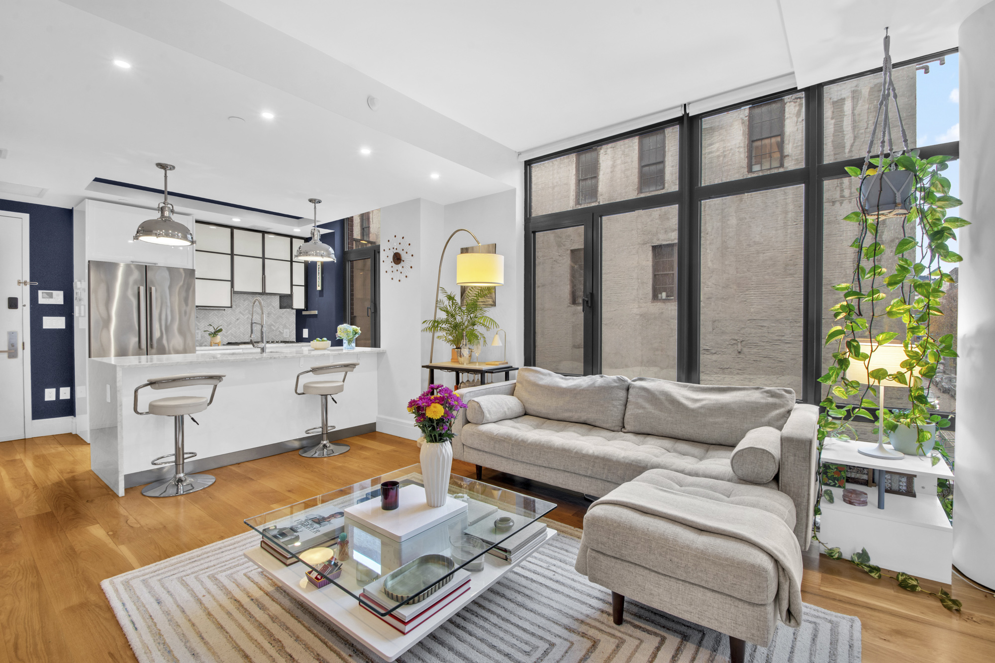47 Bridge Street, Unit 3D Brooklyn, NY 11201 - Photo 8 of 27 a living room with furniture and a large window