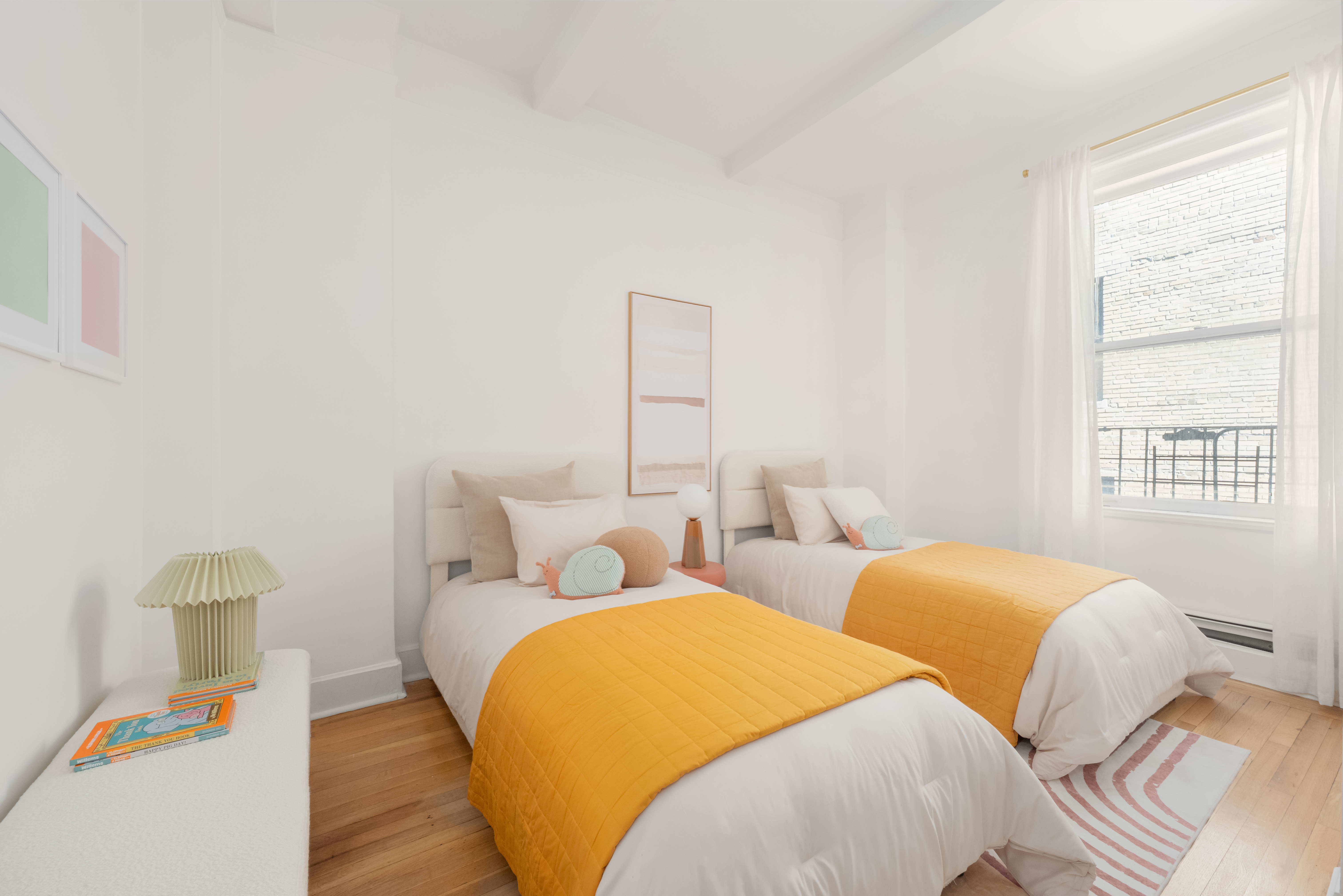 1060 Park Avenue, Unit 11A Manhattan, NY 10128 - Photo 7 of 12 a bedroom with two beds and wooden floor