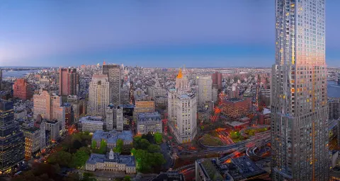 a view of a city with tall buildings
