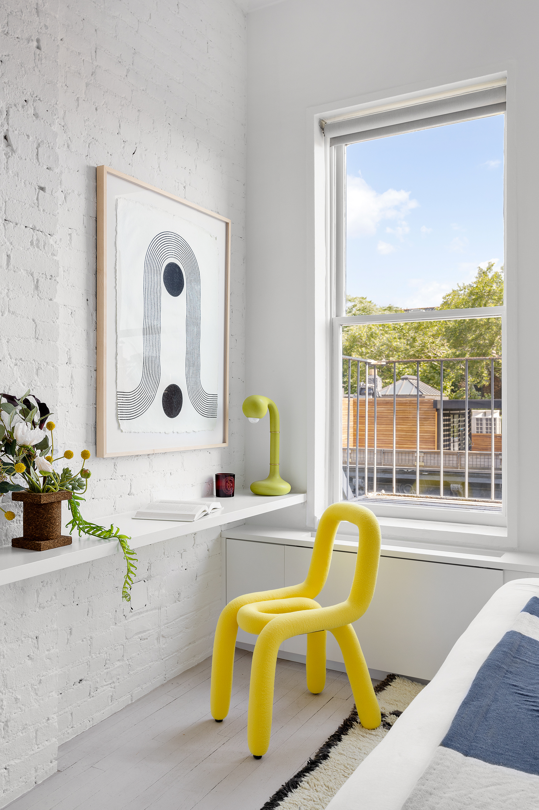 281 West 11th Street, Unit 4/5C Manhattan, NY 10014 - Photo 13 of 18 a bathroom with a sink mirror and a window