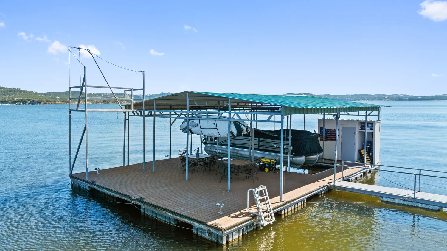 a view of a chairs and table in the terrace