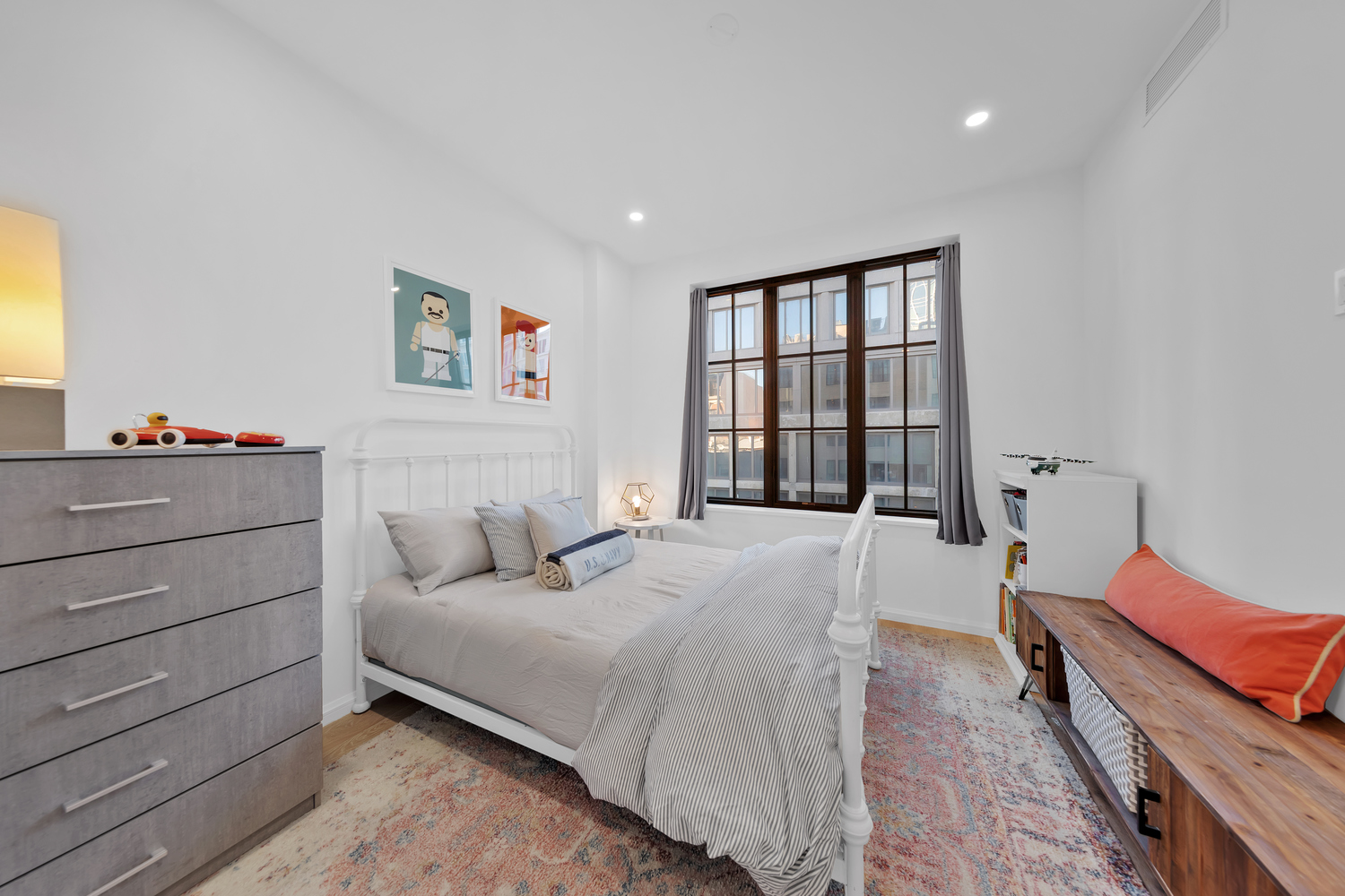 532 Clinton Avenue, Unit 5A Brooklyn, NY 11238 - Photo 9 of 11 a bedroom with a bed dresser and a window