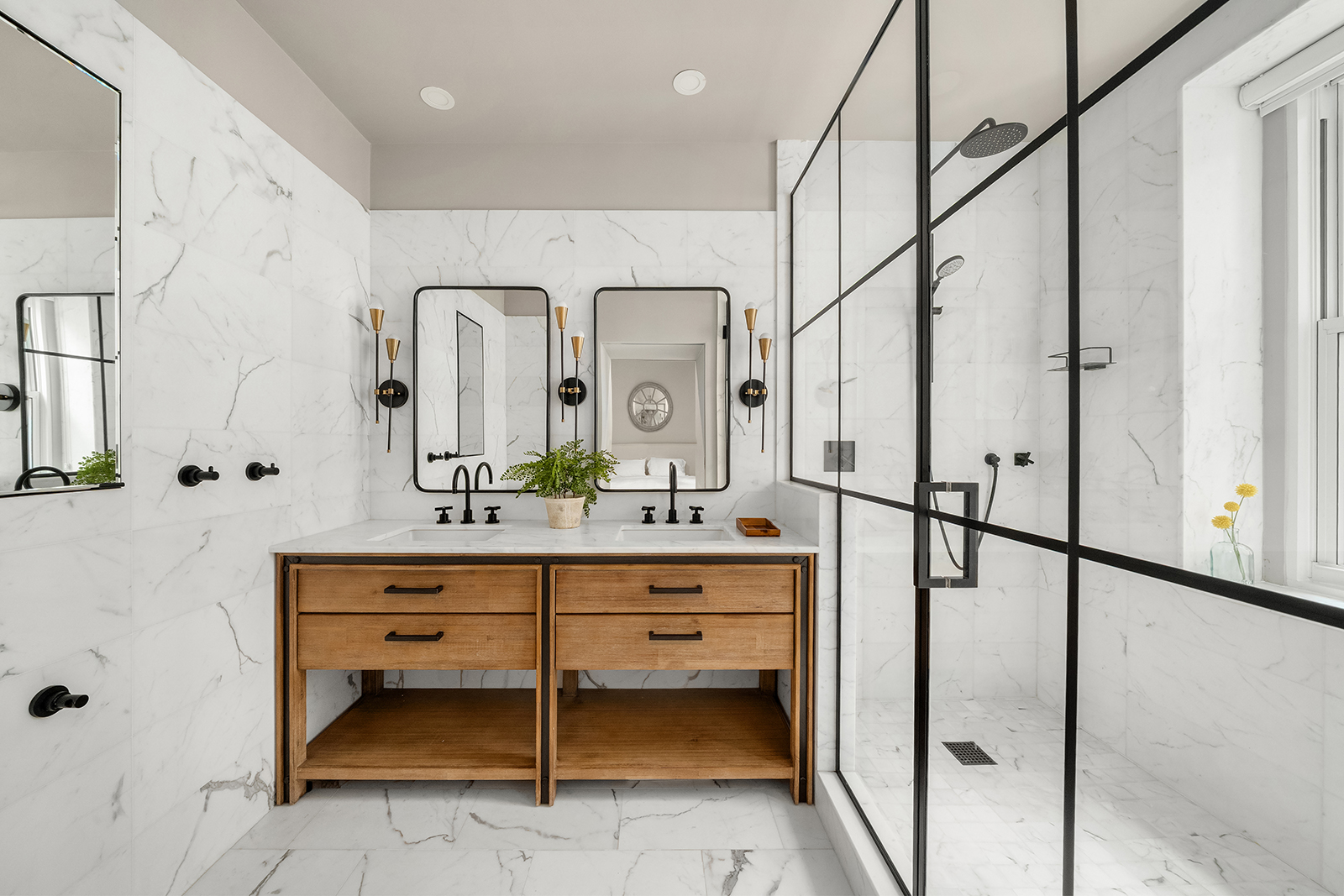 39 North Moore Street, Unit 4A Manhattan, NY 10013 - Photo 10 of 17 a spacious bathroom with a double vanity sink and a mirror