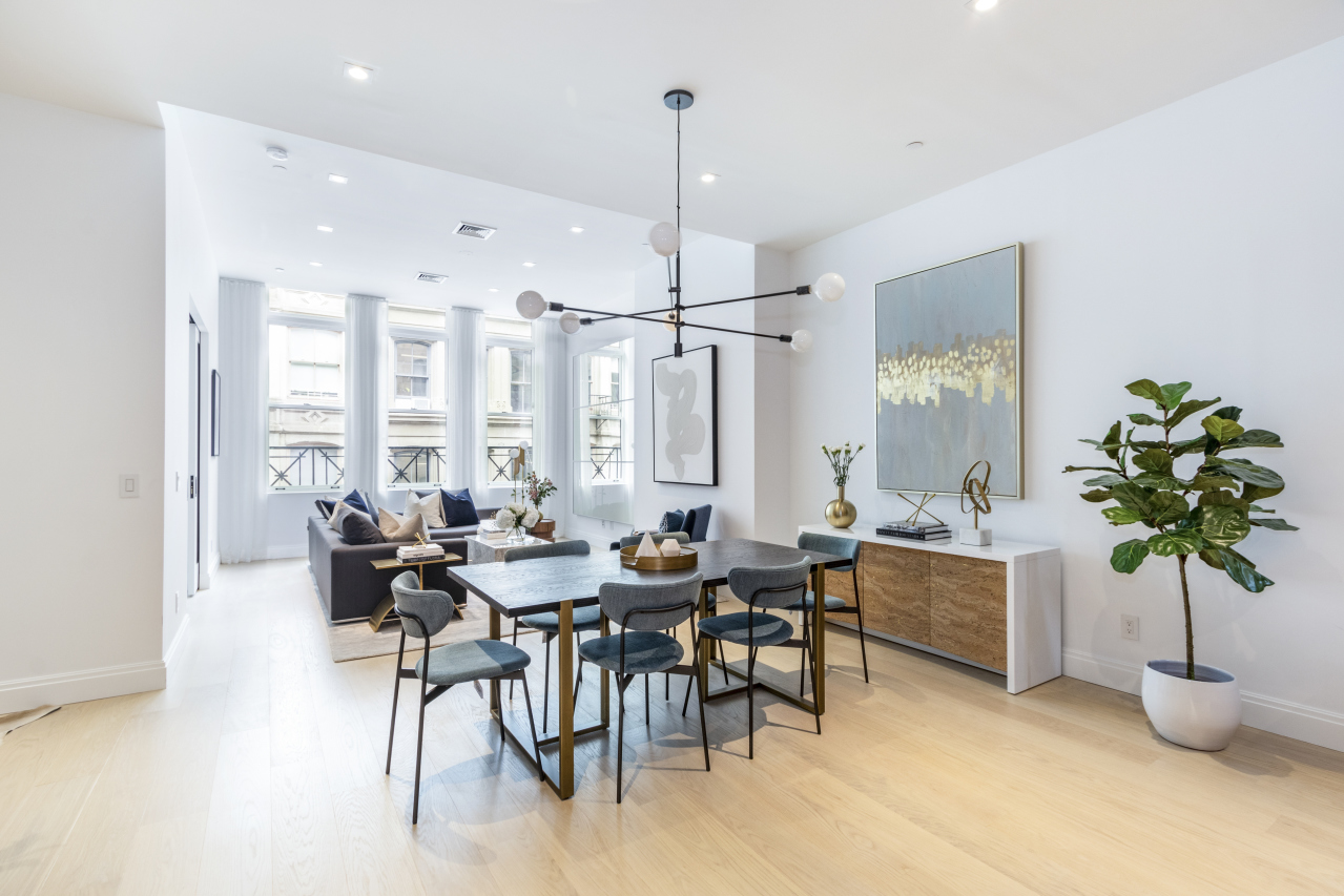 106 Franklin Street, Unit PH Manhattan, NY 10013 - Photo 3 of 13 a view of a dining room with furniture window and outside view