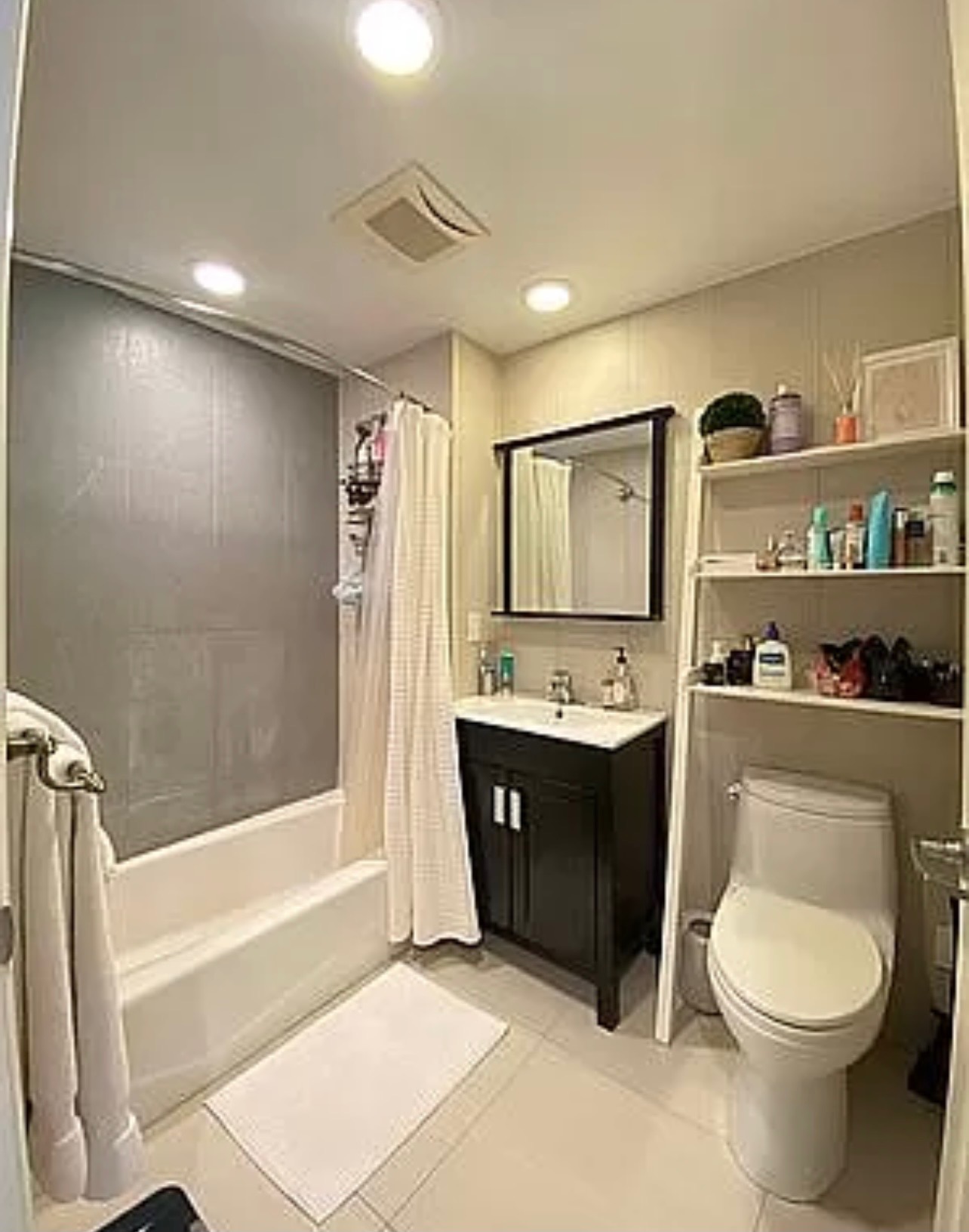 456 West 167th Street, Unit 6C Manhattan, NY 10032 - Photo 7 of 11 a spacious bathroom with a bathtub shower sink mirror and toilet