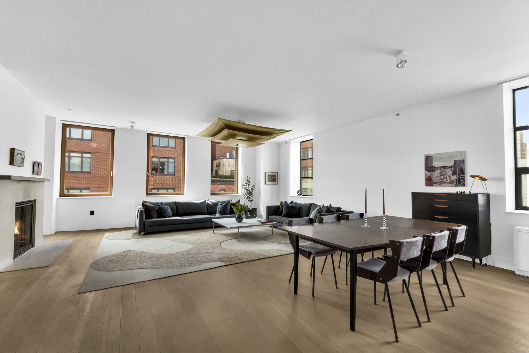 267 West 124th Street, Unit 6A Manhattan, NY 10027 - Photo 5 of 24 a view of a dining room with furniture and a large window