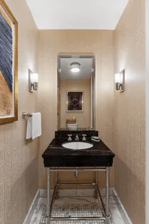 a room with a table and chairs