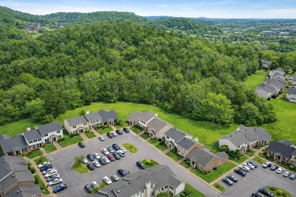 an aerial view of a house with a garden