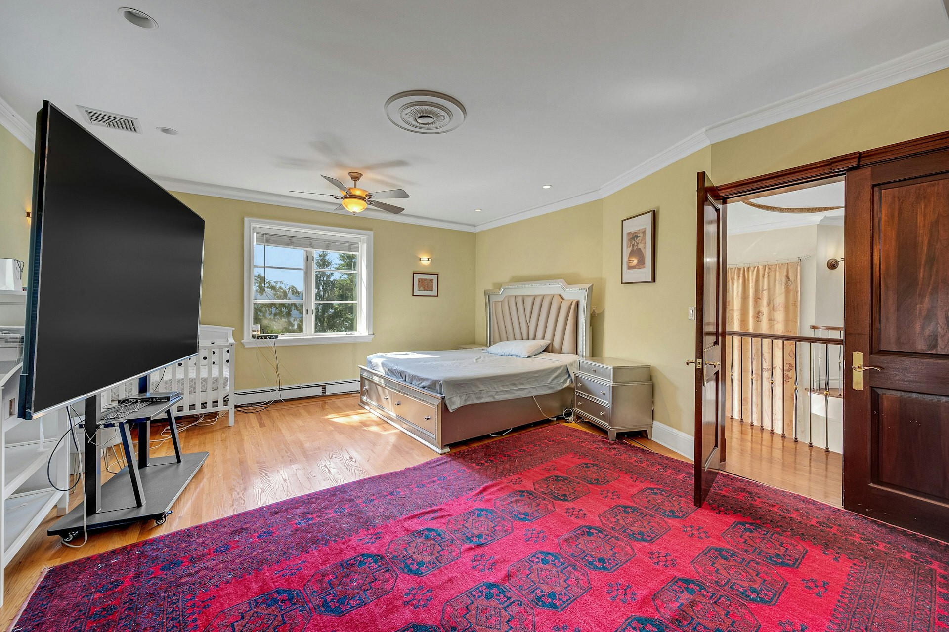 5440 Independence Avenue Bronx, NY 10471 - Photo 21 of 36 a bedroom with a bed and a window