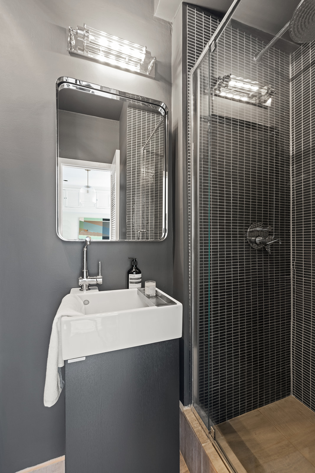 167 Clinton Street, Unit 3 Brooklyn, NY 11201 - Photo 15 of 31 a bathroom with a sink vanity and shower