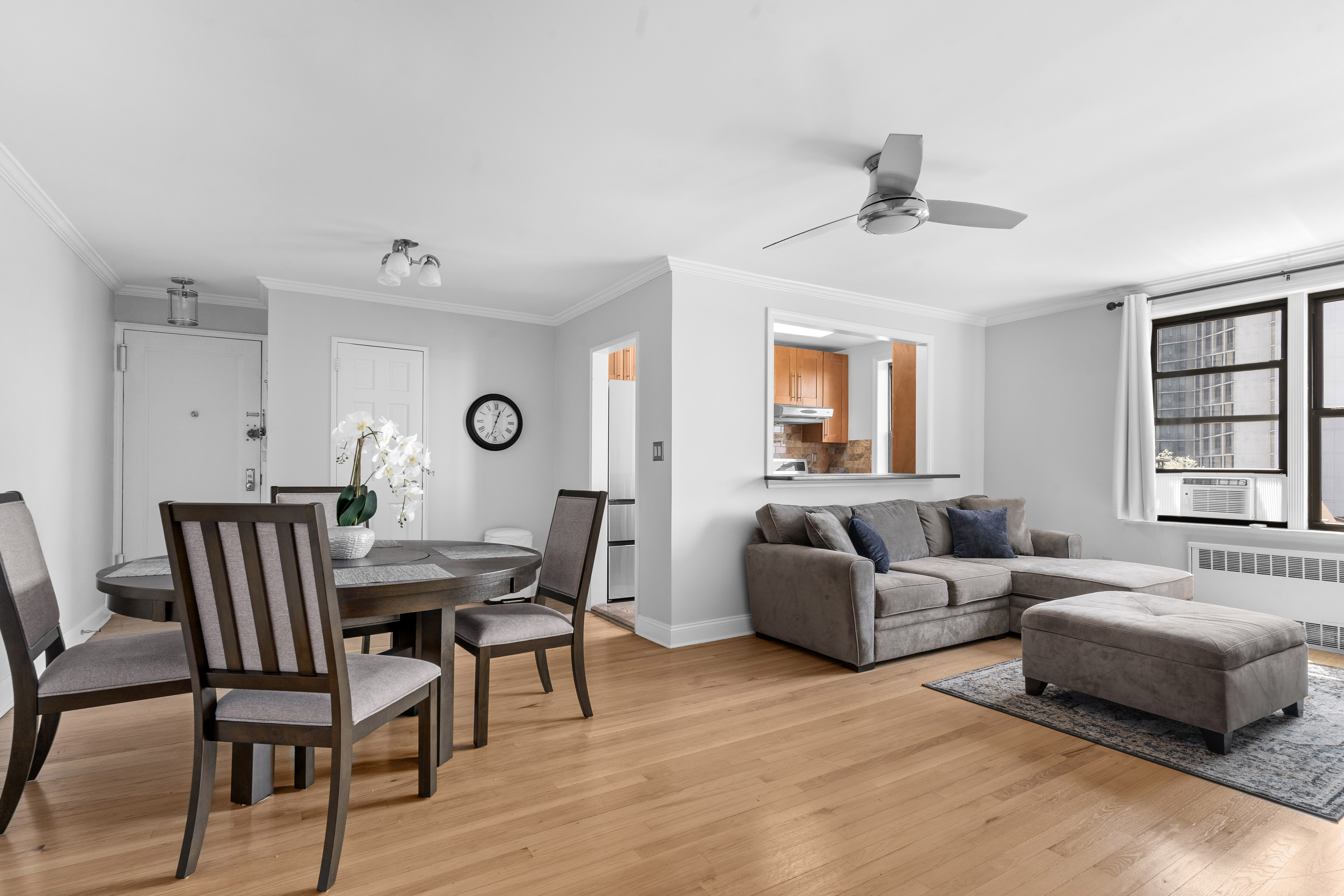 20 89th Street, Unit 5C Brooklyn, NY 11209 - Photo 3 of 10 a living room with furniture and a window