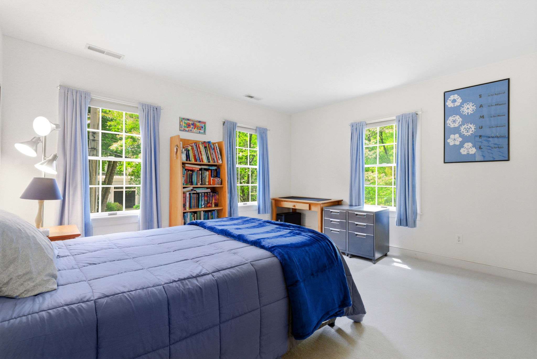 2 Laurel Street Lexington, MA 02421 - Photo 30 of 46 a bedroom with a large bed and a window