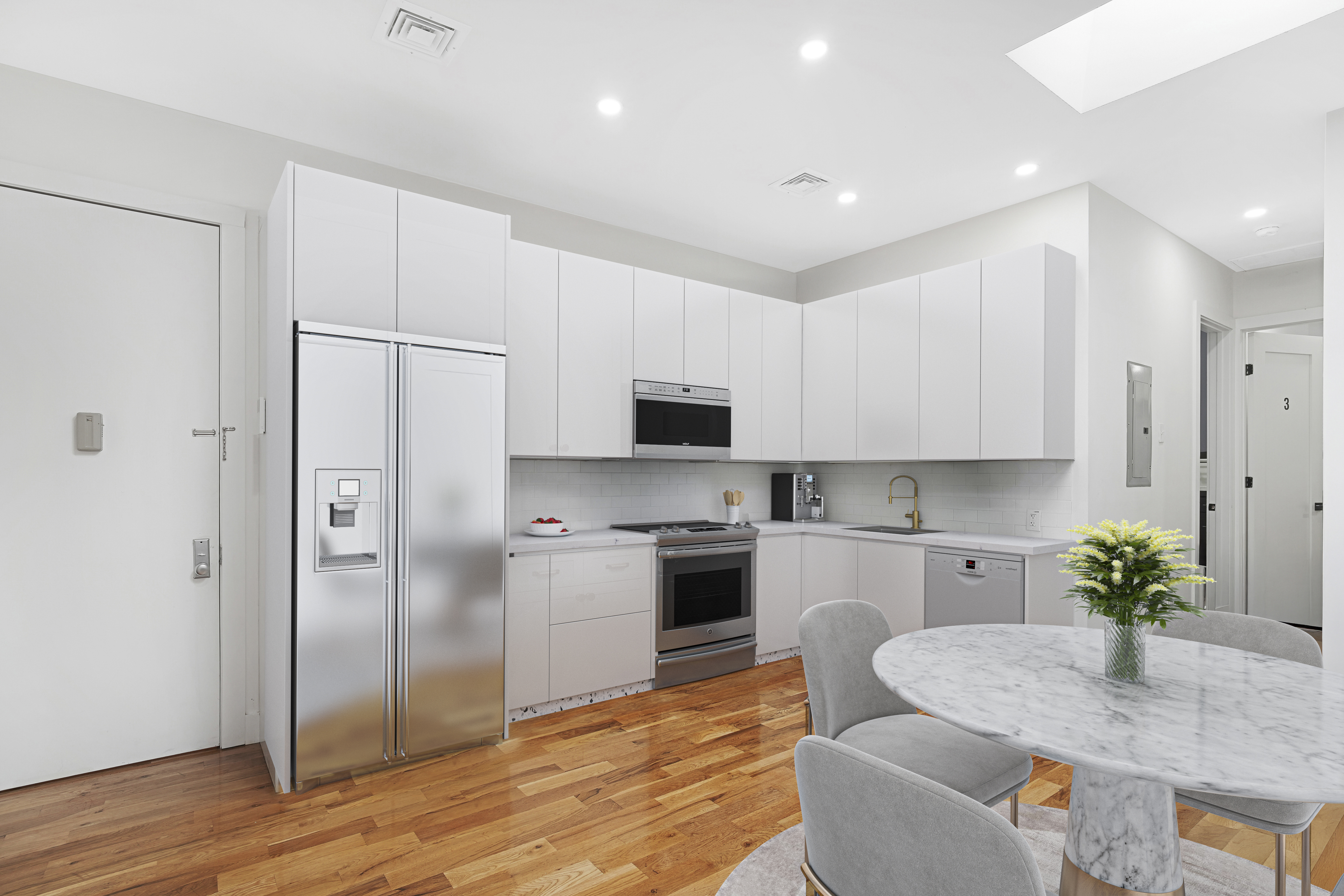 1390 Eastern Parkway Brooklyn, NY 11233 - Photo 2 of 19 a kitchen with granite countertop a refrigerator a stove a sink and cabinets