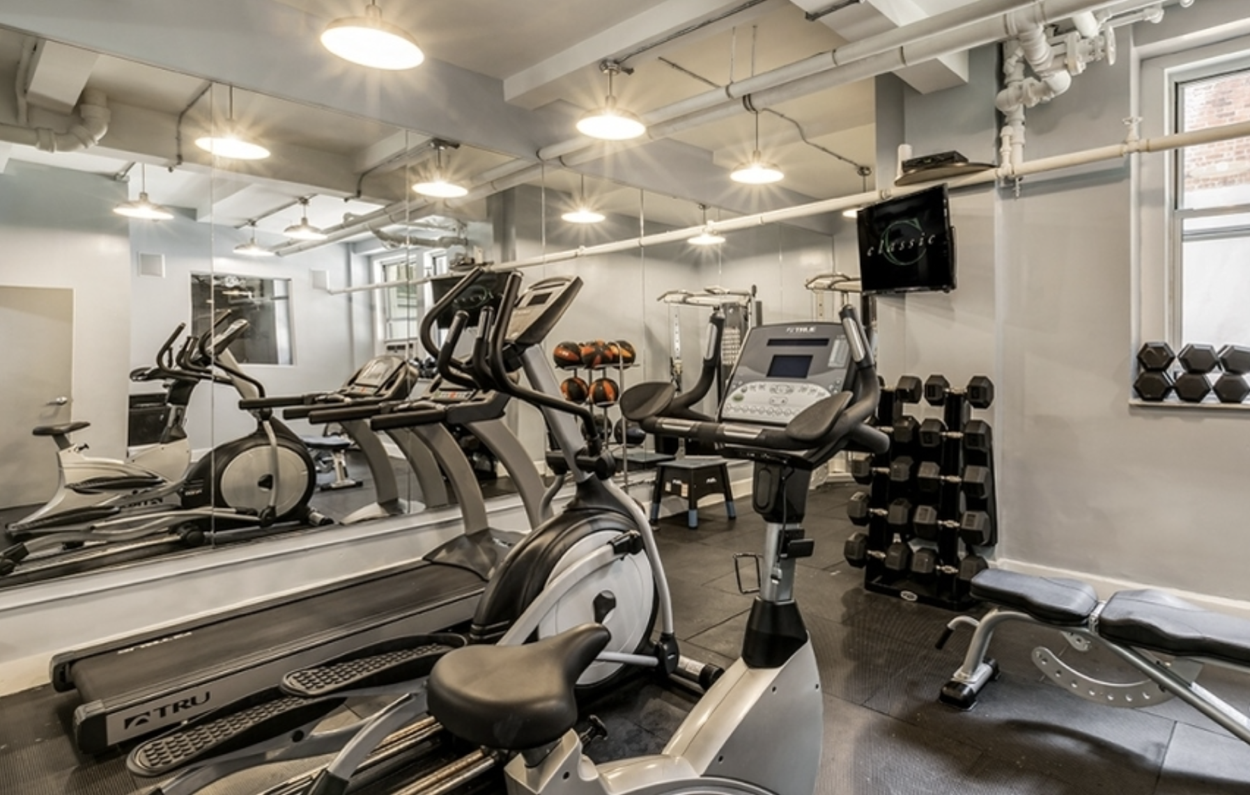 165 West 91st Street, Unit 15B Manhattan, NY 10024 - Photo 20 of 24 a view of a room with gym equipment