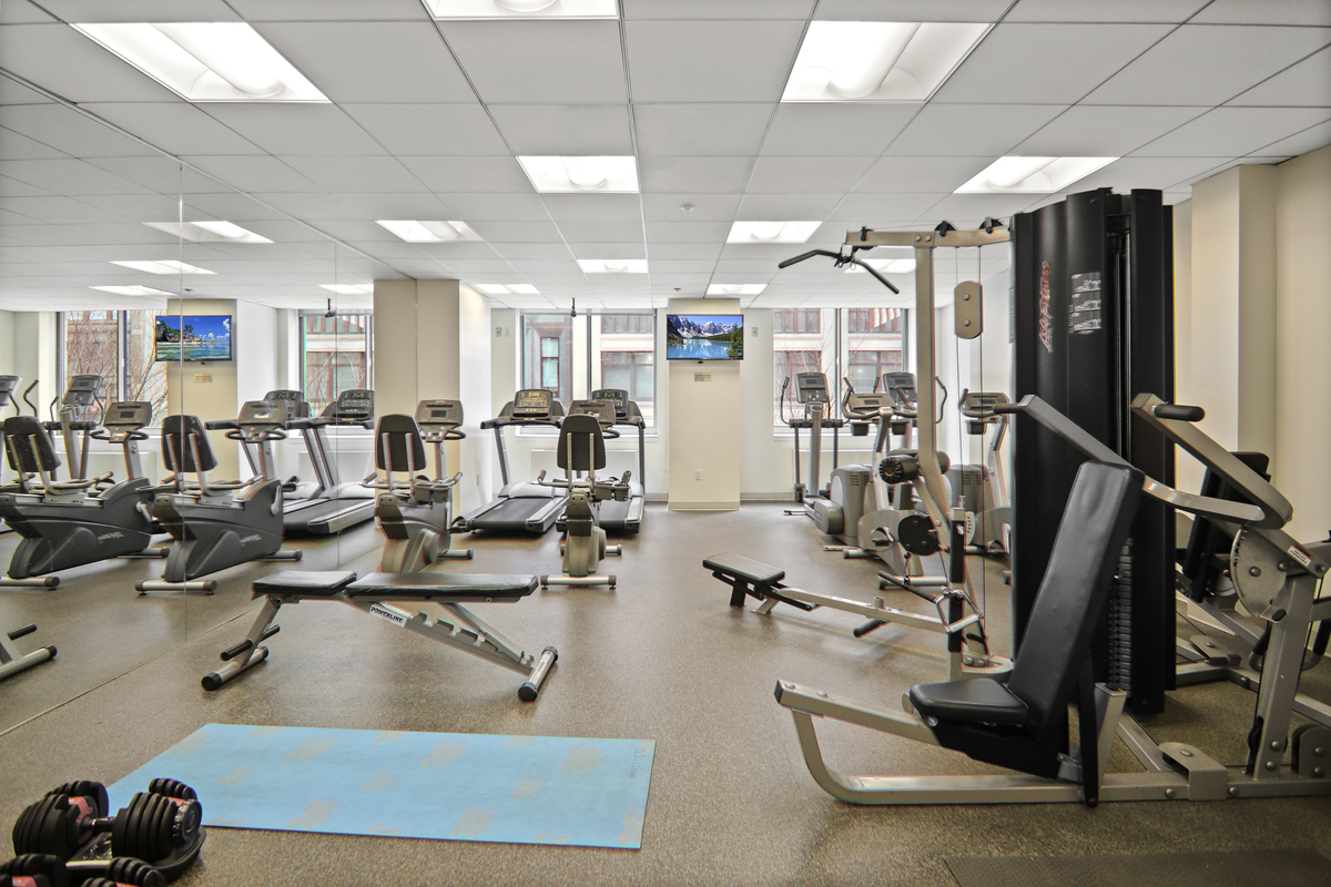 121 East 23rd Street, Unit 4H Manhattan, NY 10010 - Photo 6 of 12 a view of a room with gym equipment