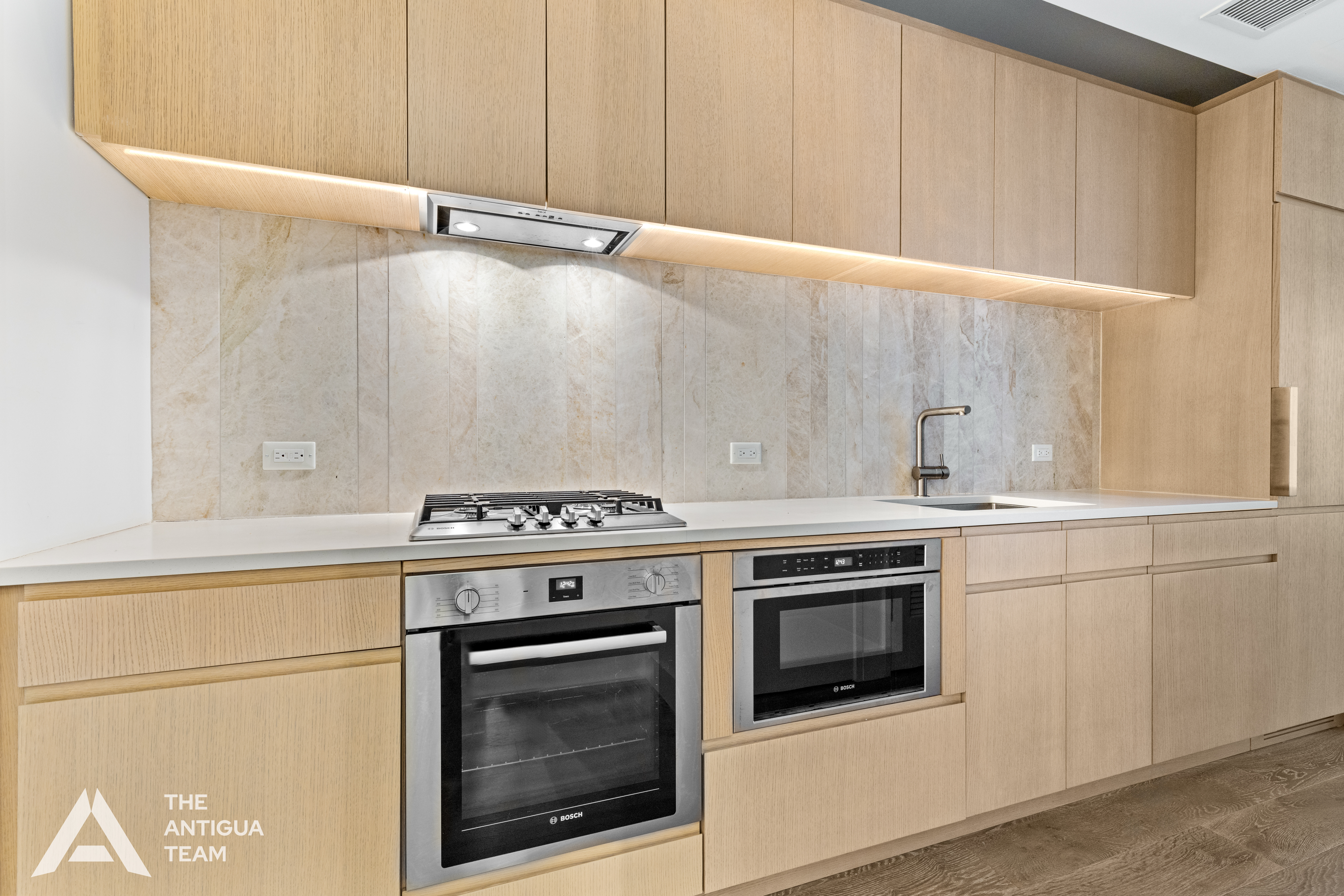 10 Nevins Street, Unit 3H Brooklyn, NY 11217 - Photo 2 of 12 a stove top oven sitting inside of a kitchen