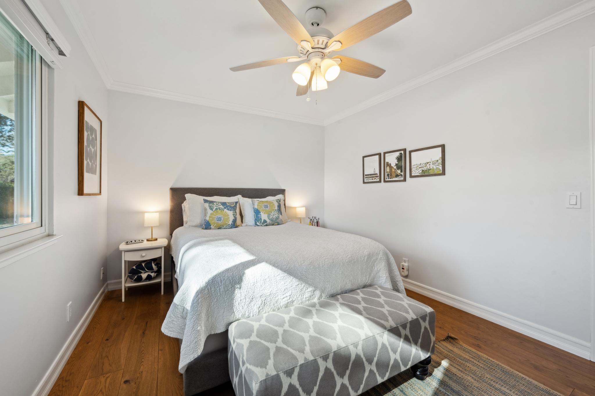 123 Frey Road Santa Rosa, CA 95409 - Photo 31 of 62 a bedroom with a bed and a chandelier