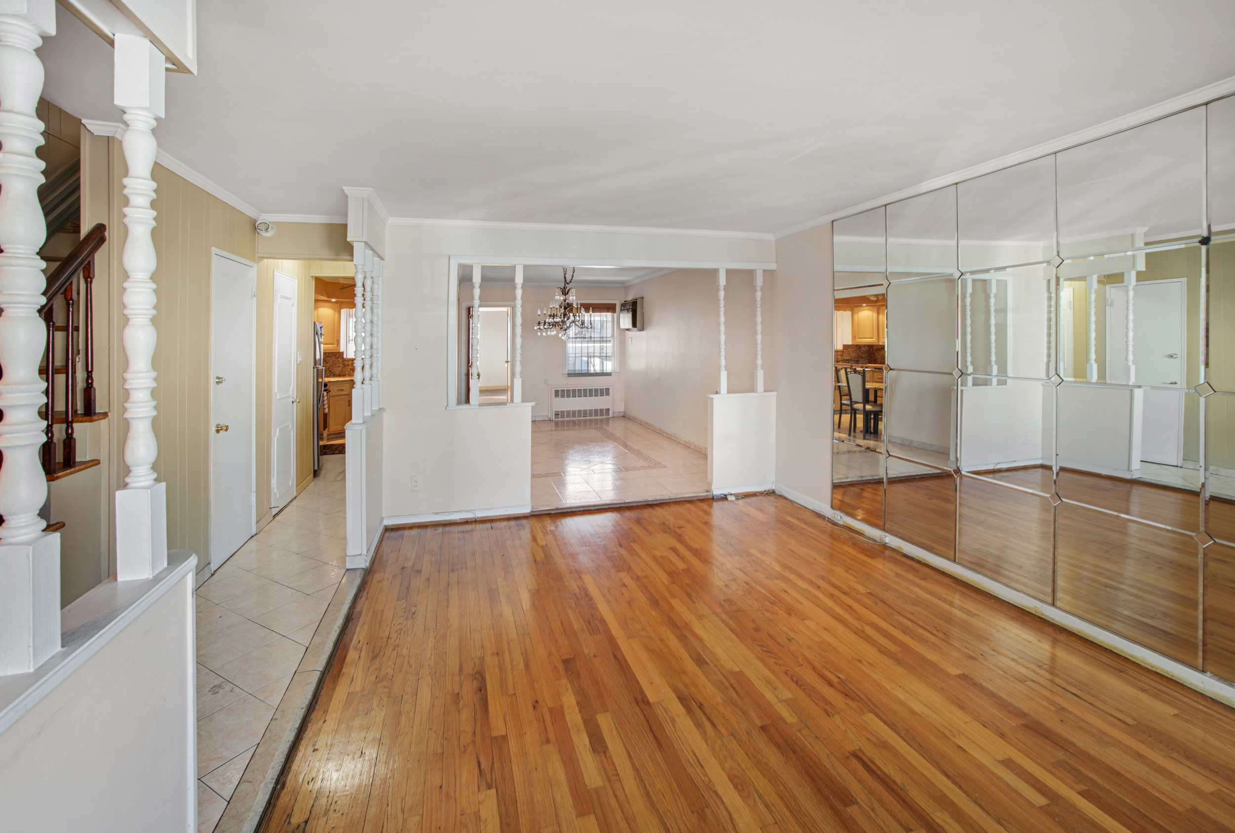 1986 West 13th Street Brooklyn, NY 11223 - Photo 3 of 11 a view of a big room with wooden floor and windows