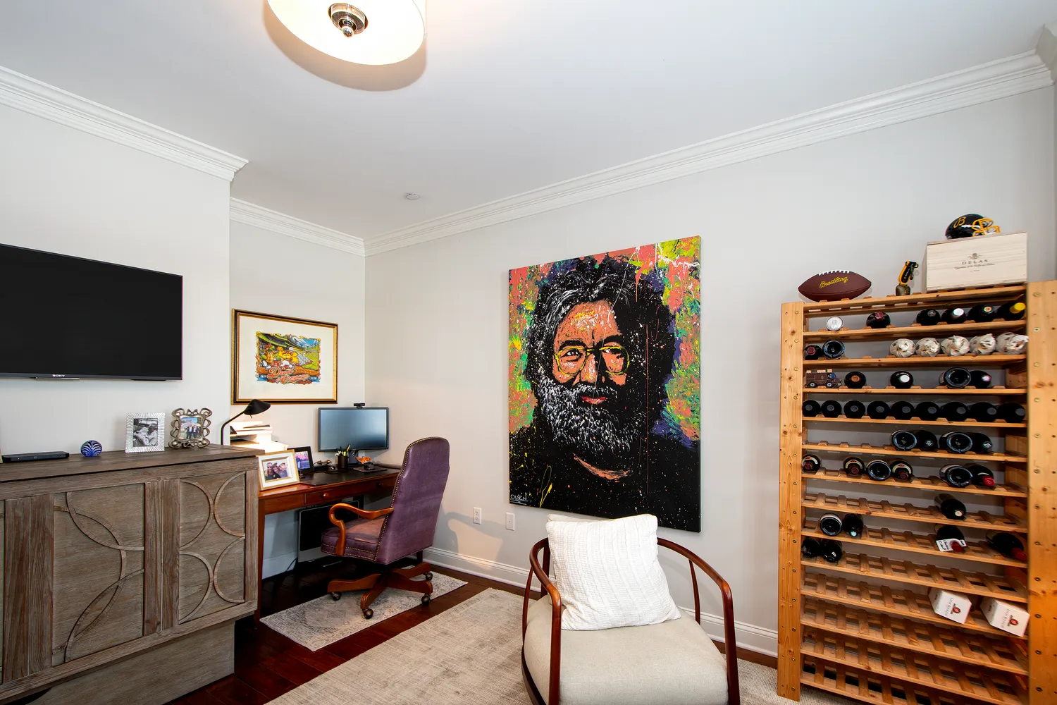 a livingroom with a workspace