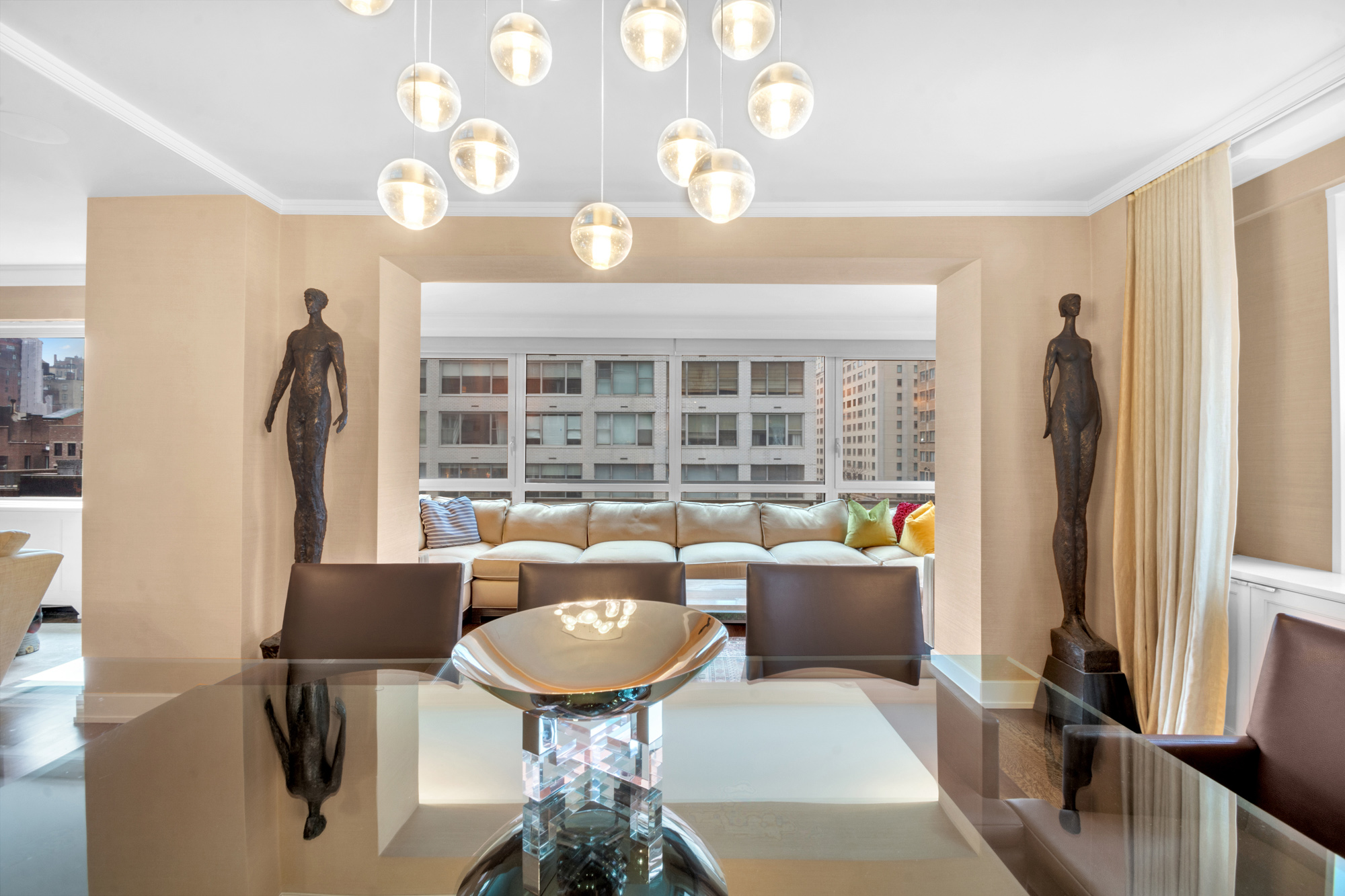 150 East 69th Street, Unit 6Q Manhattan, NY 10021 - Photo 6 of 15 a view of a livingroom with furniture window and entryway