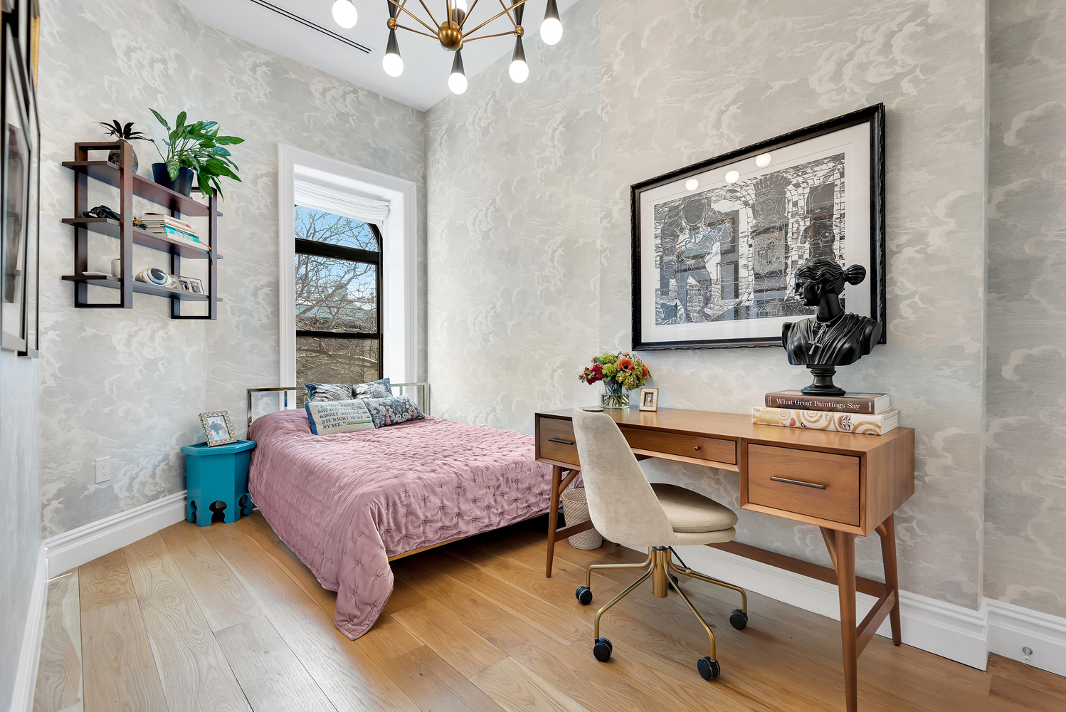 533 Decatur Street, Unit 1 Brooklyn, NY 11233 - Photo 13 of 20 a bedroom with a bed and a table