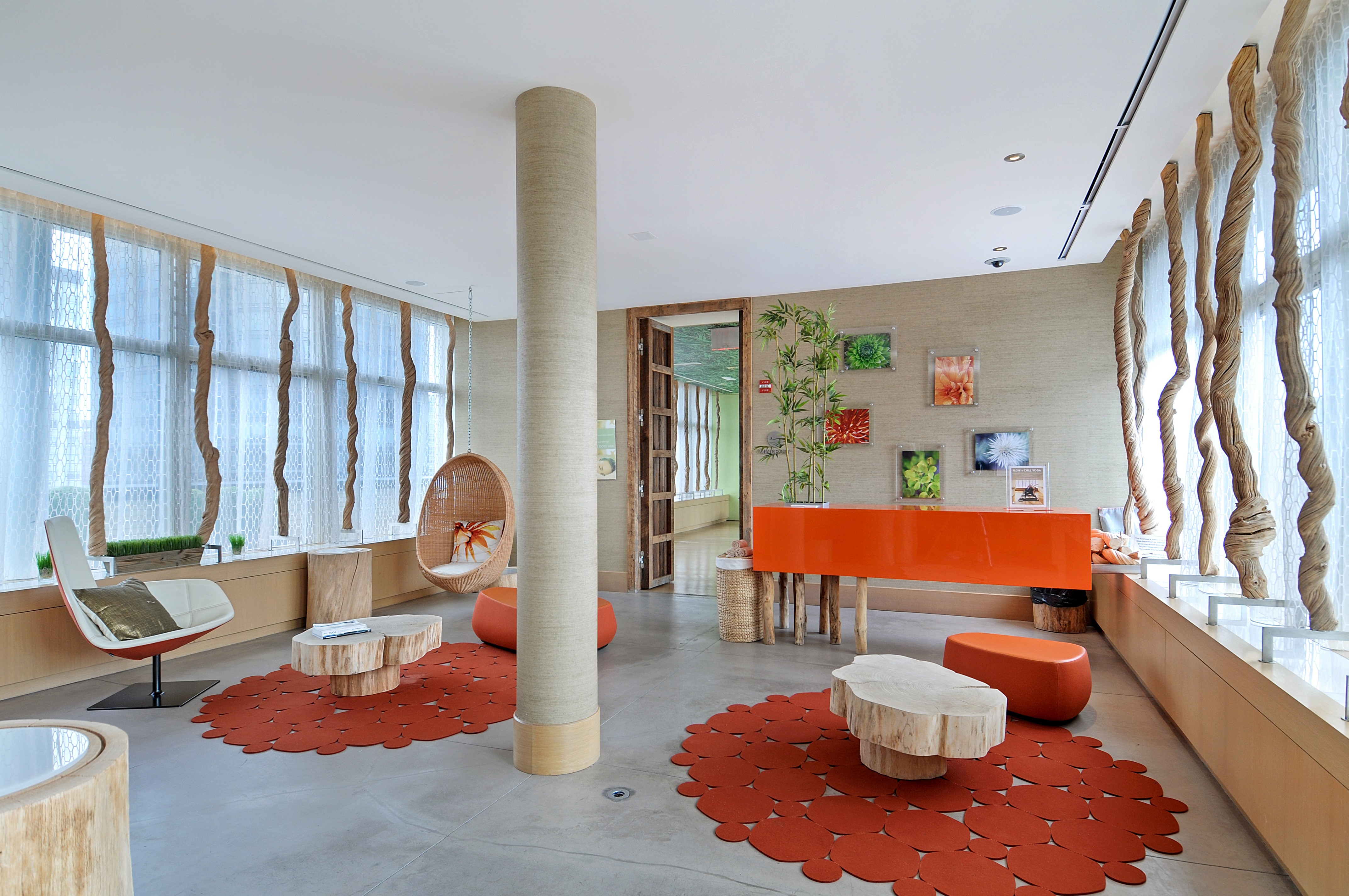 200 East 66th Street, Unit D804 Manhattan, NY 10065 - Photo 8 of 10 a living room with furniture and a large window