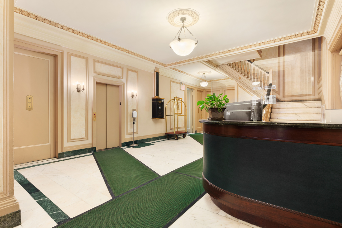 885 West End Avenue, Unit 12D Manhattan, NY 10025 - Photo 19 of 24 a view of living room with kitchen island furniture and a wooden floor