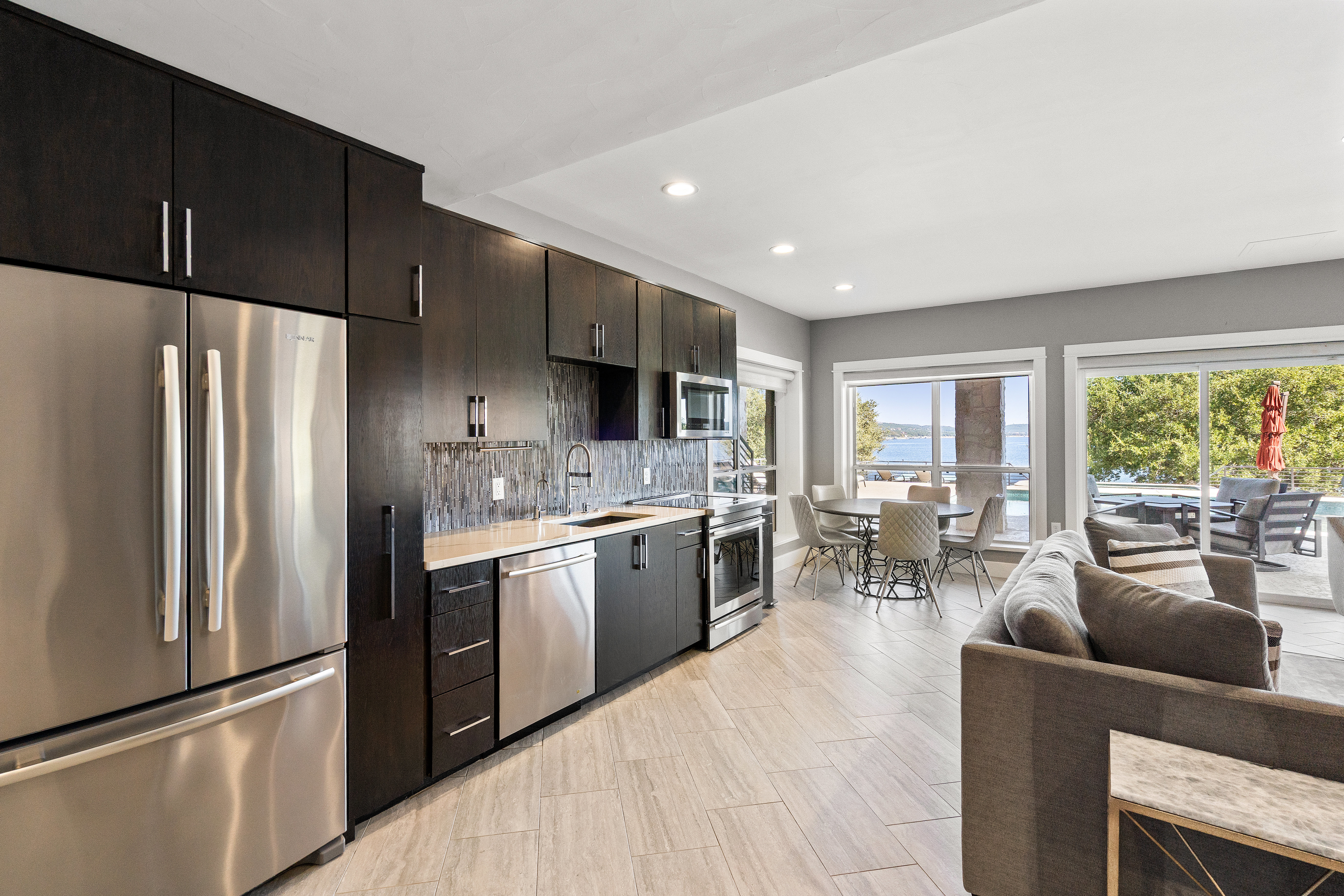 15210 Rainbow 1 Street Austin, TX 78734 - Photo 80 of 138 a kitchen with stainless steel appliances granite countertop a refrigerator stove and sink