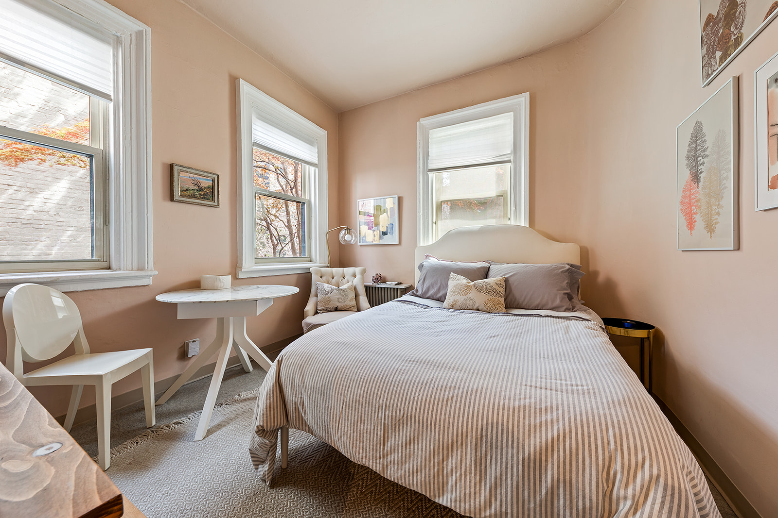 198 6th Avenue Manhattan, NY 10013 - Photo 16 of 45 a bedroom with a bed and a window