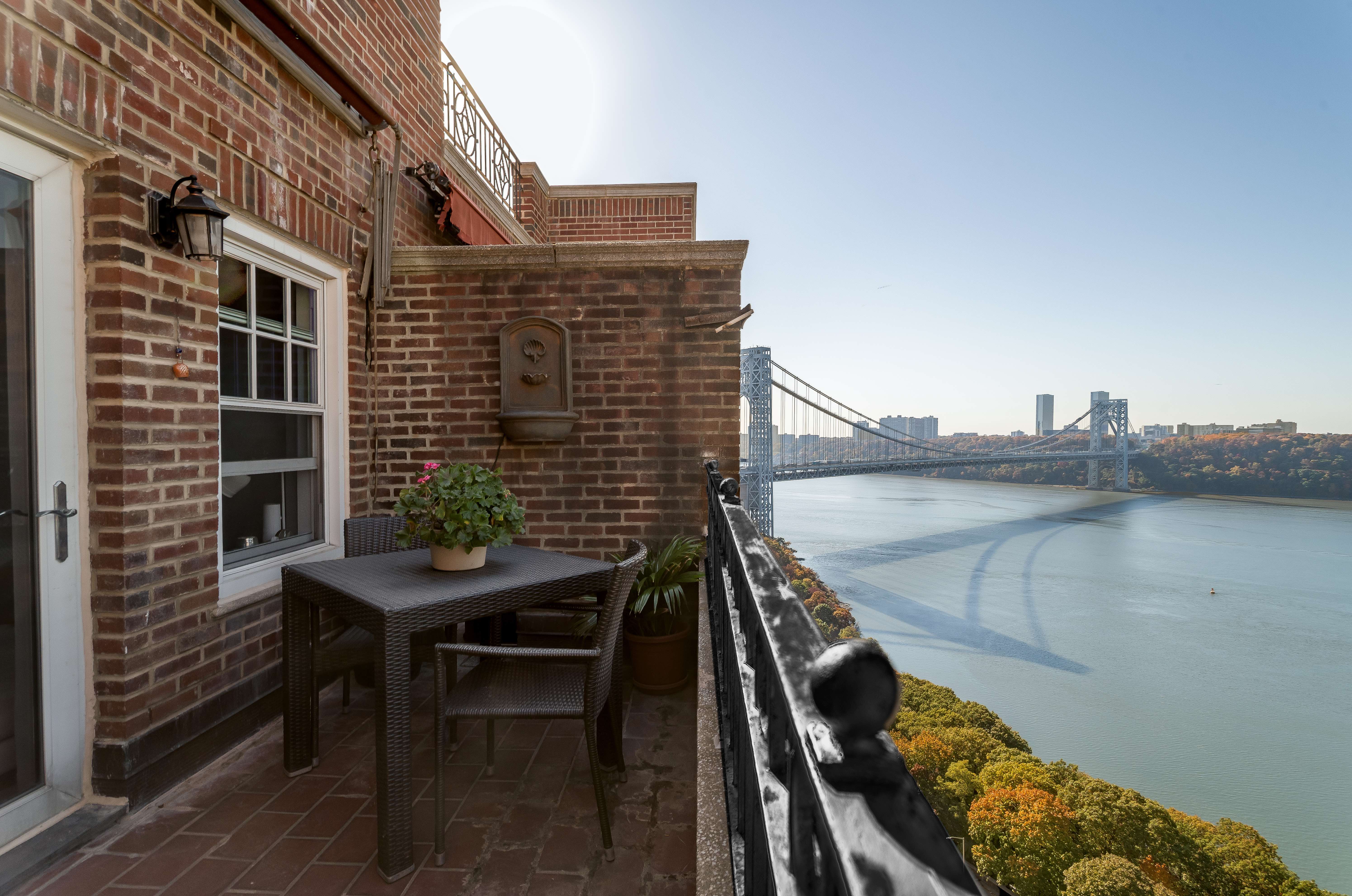 140 Cabrini Boulevard, Unit PH138 Manhattan, NY 10033 - Photo 15 of 30 a view of balcony with outdoor seating and city view