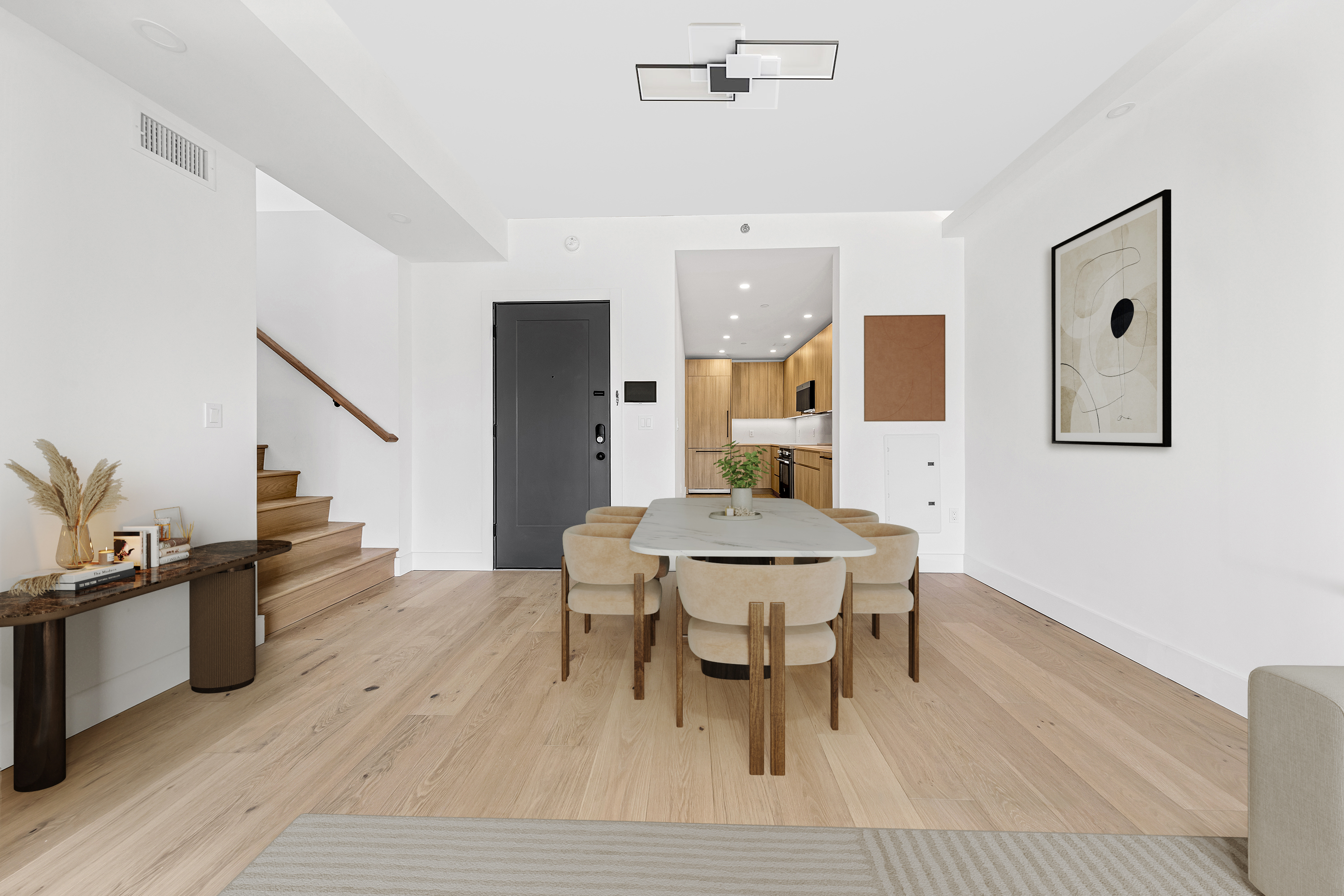 12-16 30th Avenue, Unit 403 Queens, NY 11102 - Photo 3 of 19 a view of a dining room with furniture and wooden floor