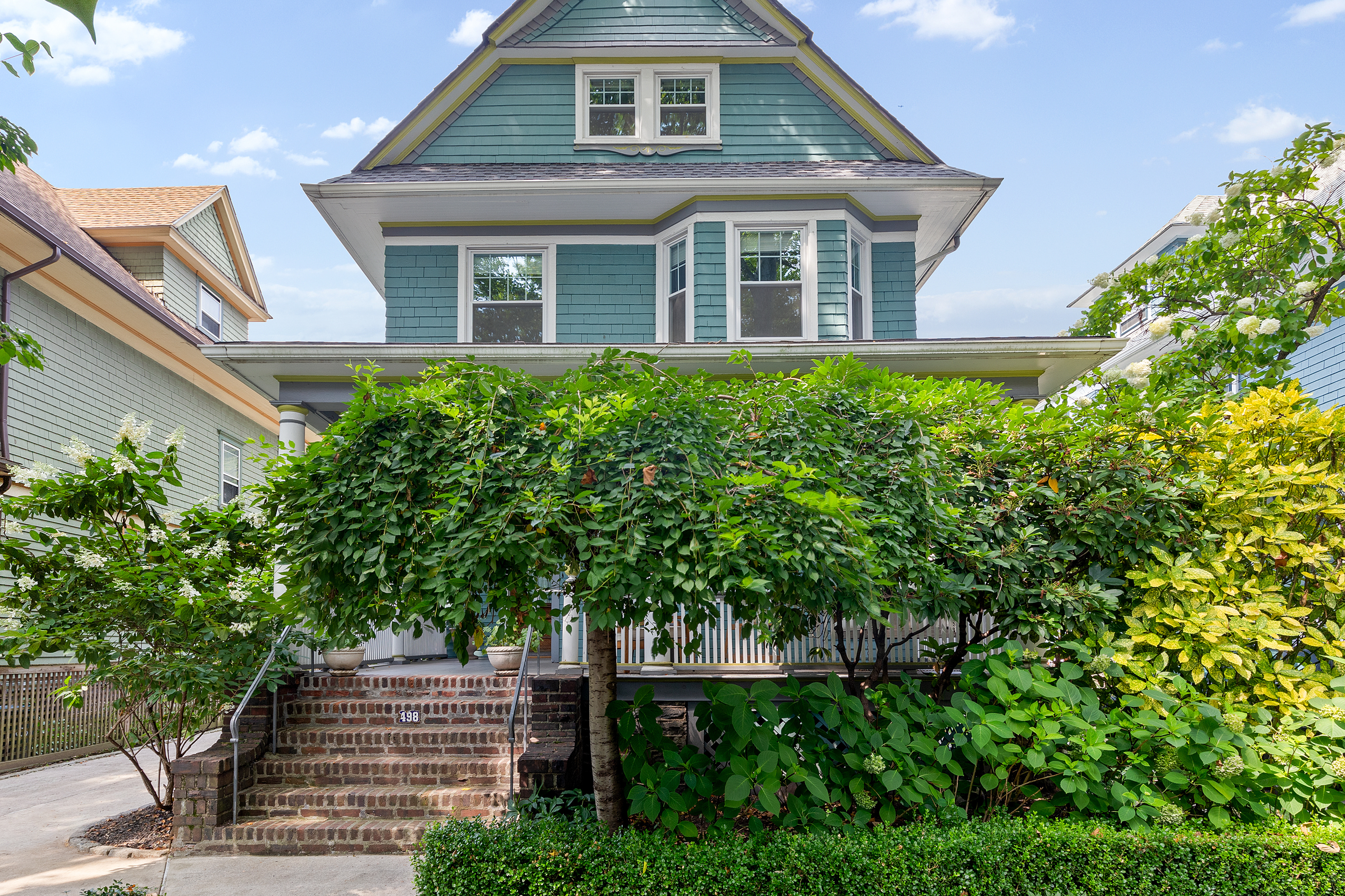 498 Westminster Road Brooklyn, NY 11218 - Photo 30 of 32 a front view of a house with a yard