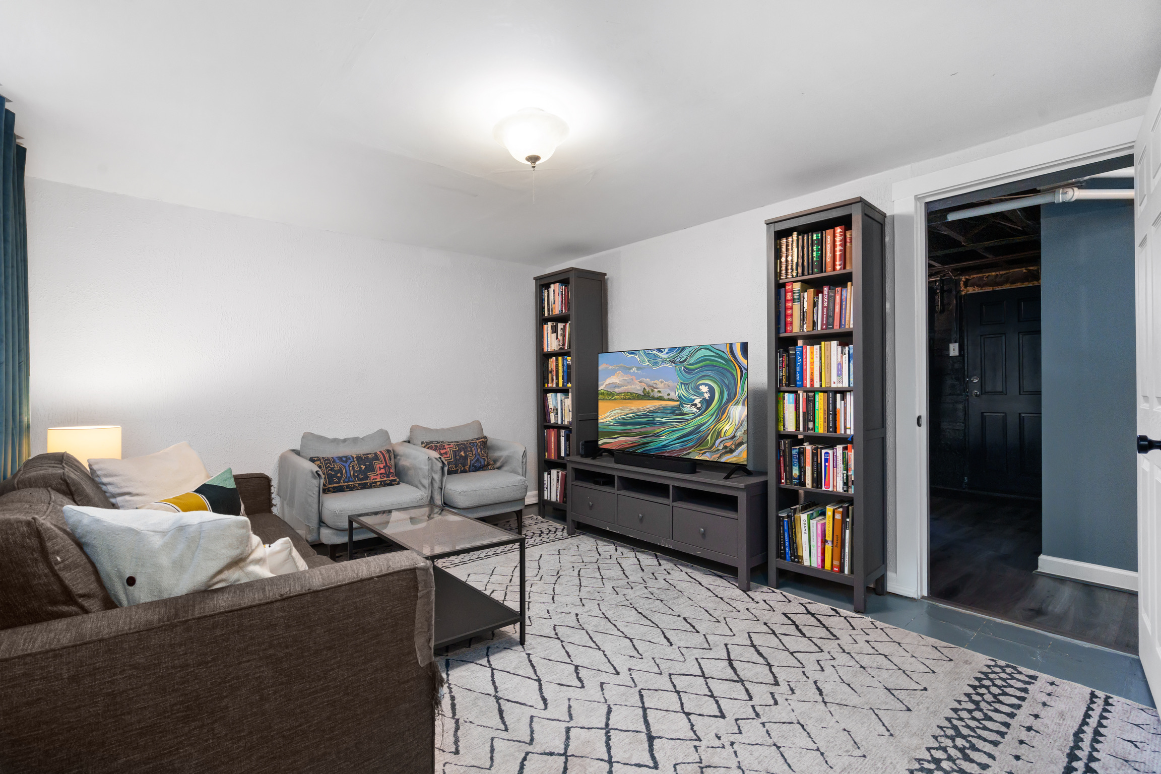 Address Upon Request Washington, DC 20017 - Photo 27 of 35 a living room with furniture and a flat screen tv