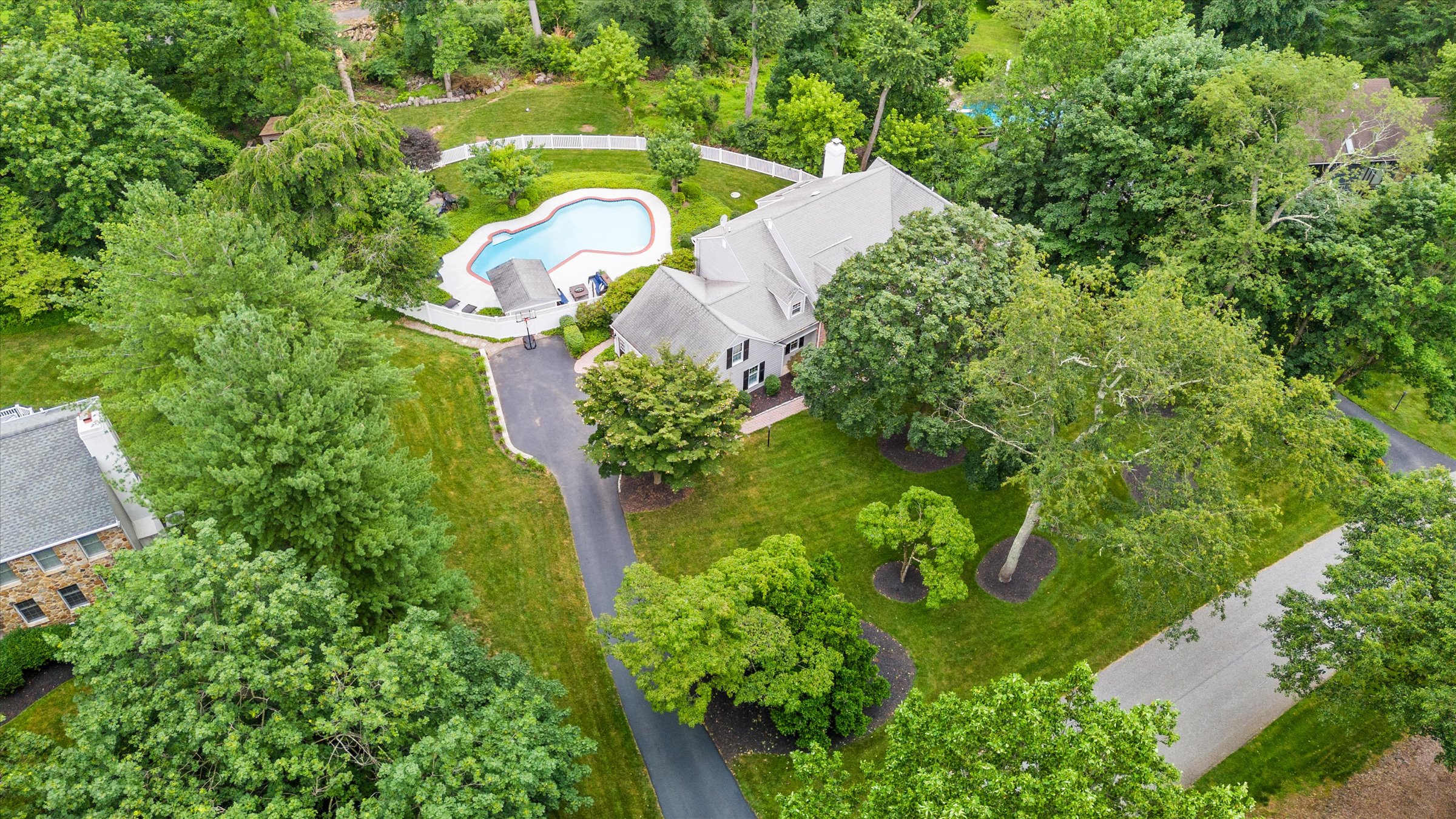 Address Upon Request West Chester, PA 19382 - Photo 66 of 76 an aerial view of a house with a yard and trees all around