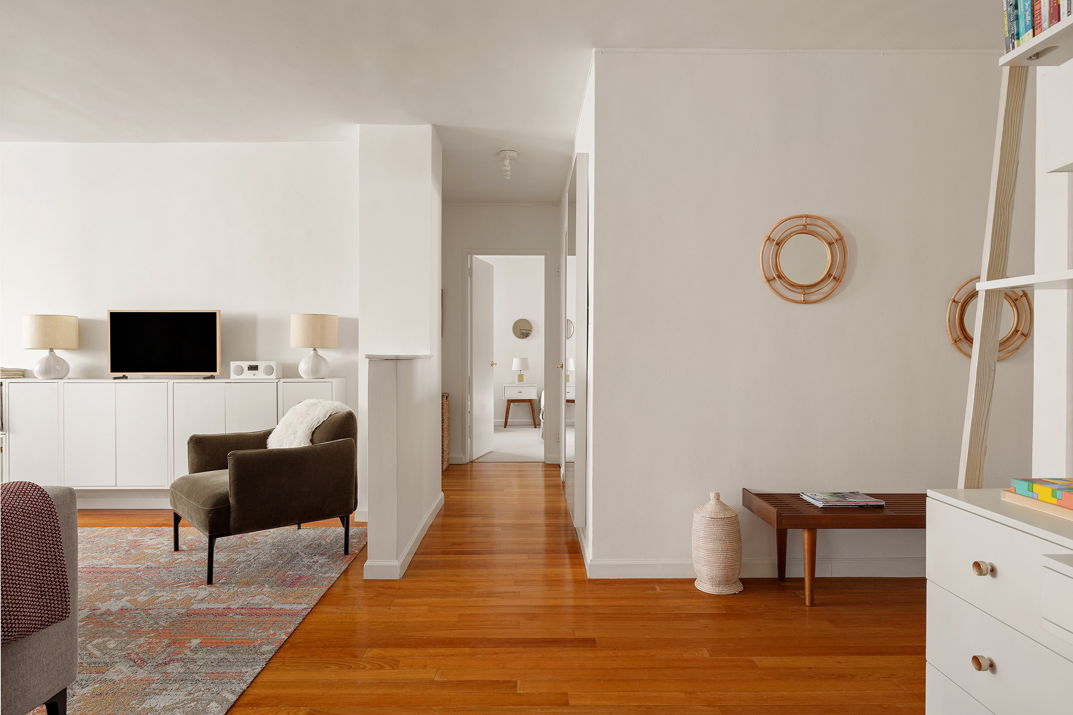 175 Willoughby Street, Unit 11L Brooklyn, NY 11201 - Photo 2 of 16 a living room with furniture and a table