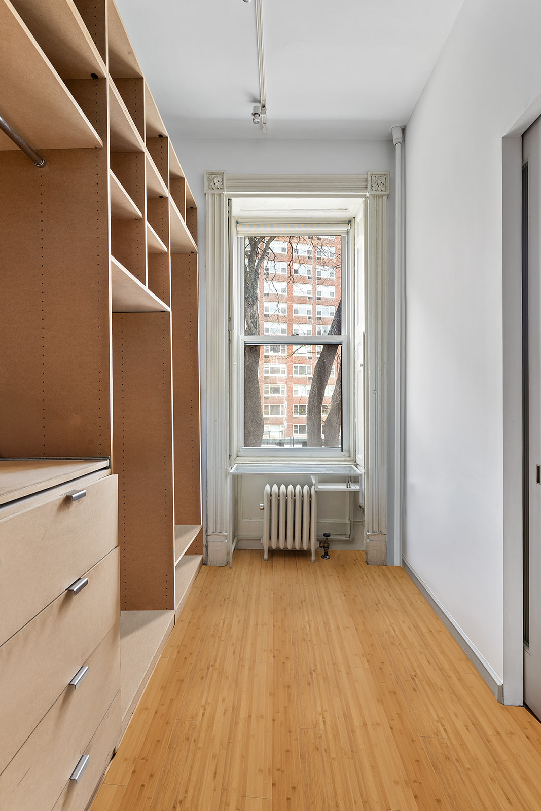 198 6th Avenue Manhattan, NY 10013 - Photo 12 of 45 a view of an empty room with a window