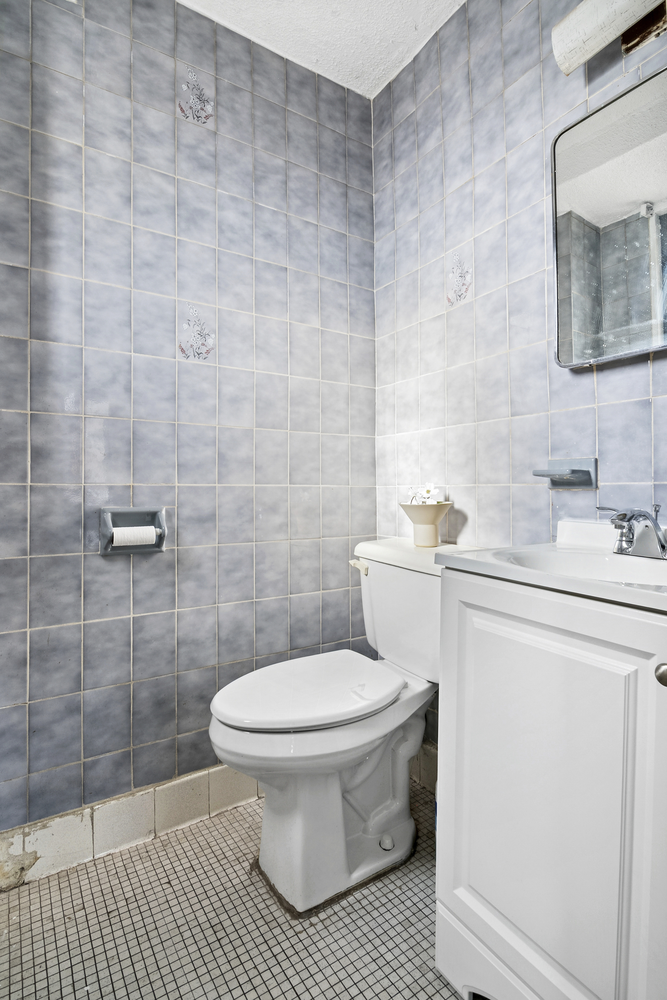 195 Willoughby Avenue, Unit 1206 Brooklyn, NY 11205 - Photo 7 of 10 a white toilet sitting next to a bathroom sink