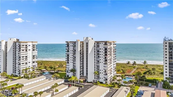 a view of an ocean and a building