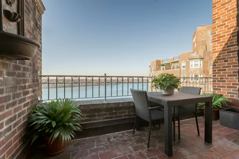 a view of a chairs and table on the terrace