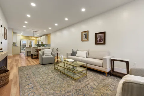 a living room with furniture and a couch