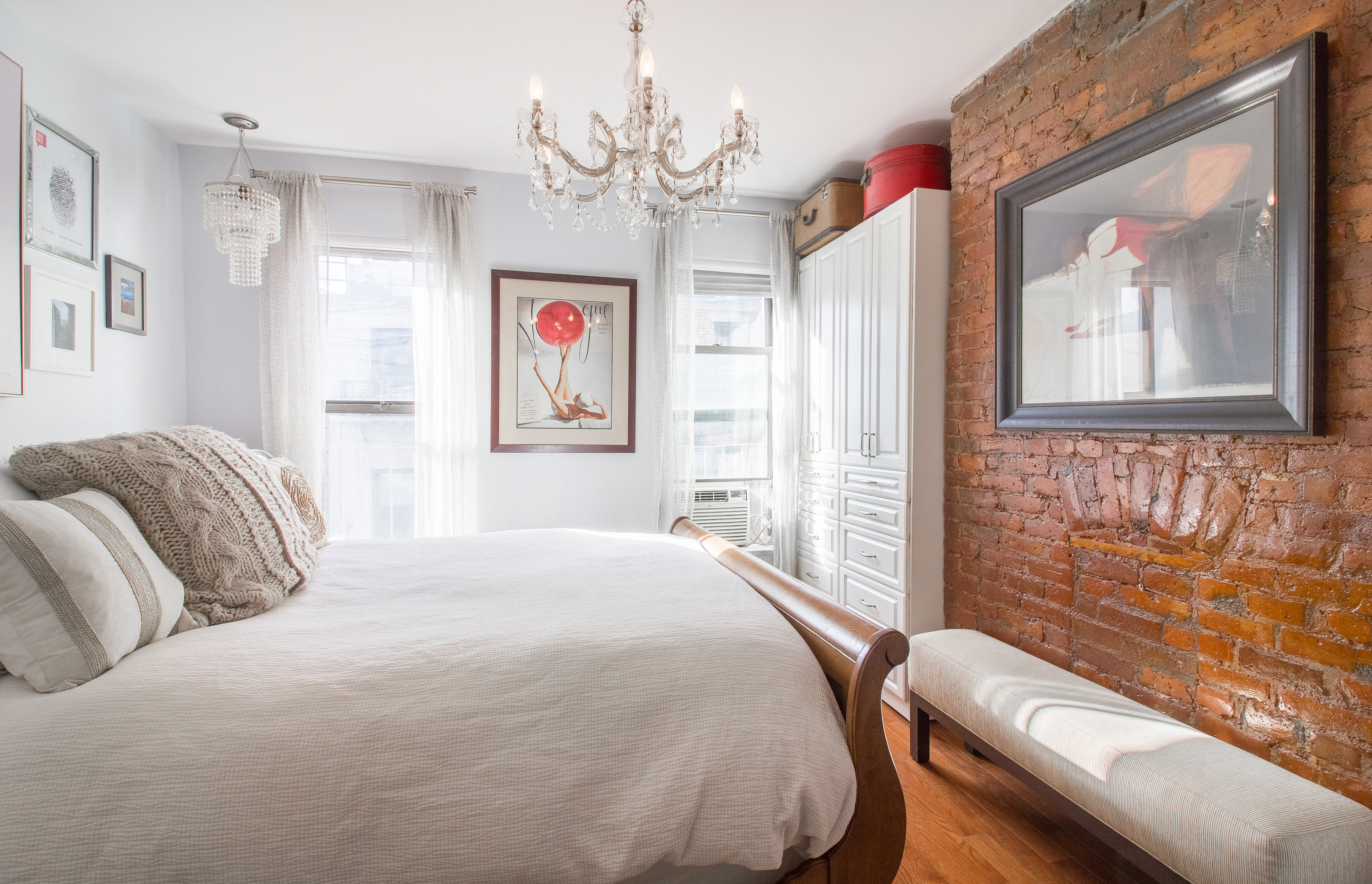 246 East 90th Street, Unit 5C Manhattan, NY 10128 - Photo 6 of 13 a bedroom with a bed dresser and window