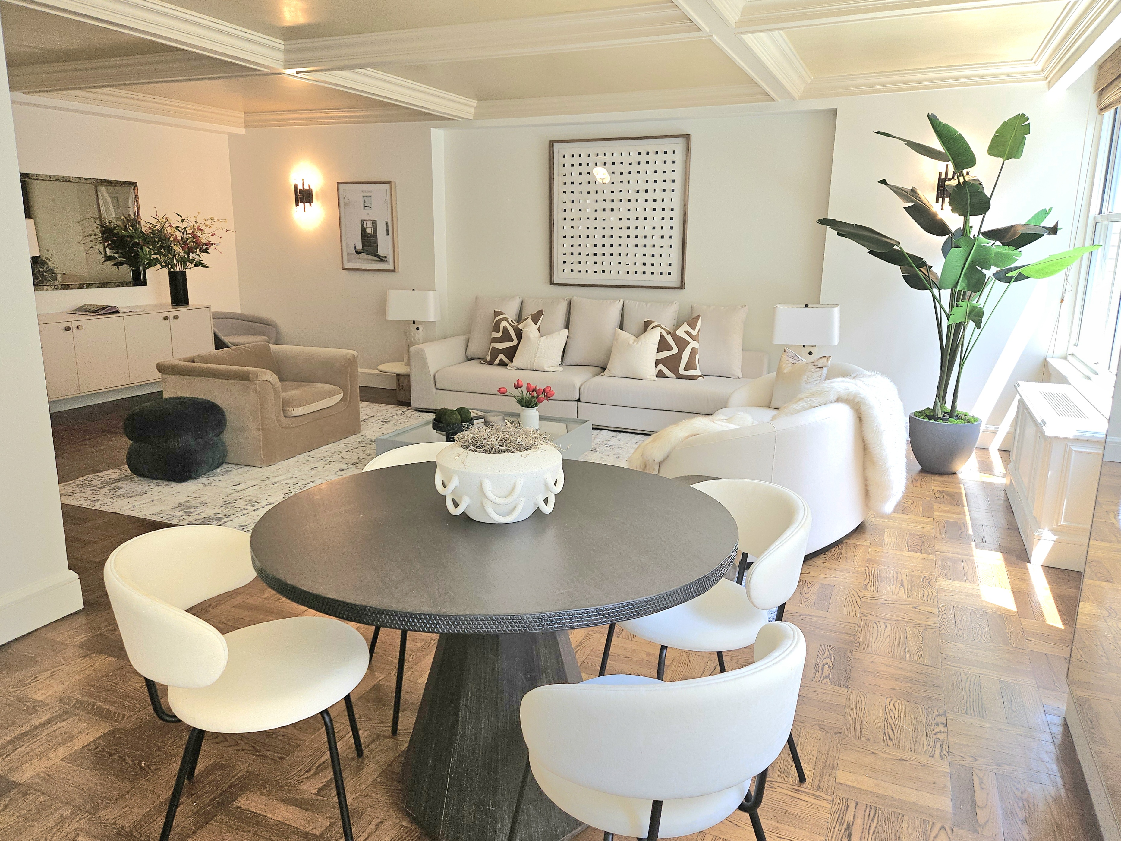 169 East 69th Street, Unit 7/8 B Manhattan, NY 10021 - Photo 2 of 30 a view of a dining room with furniture and wooden floor