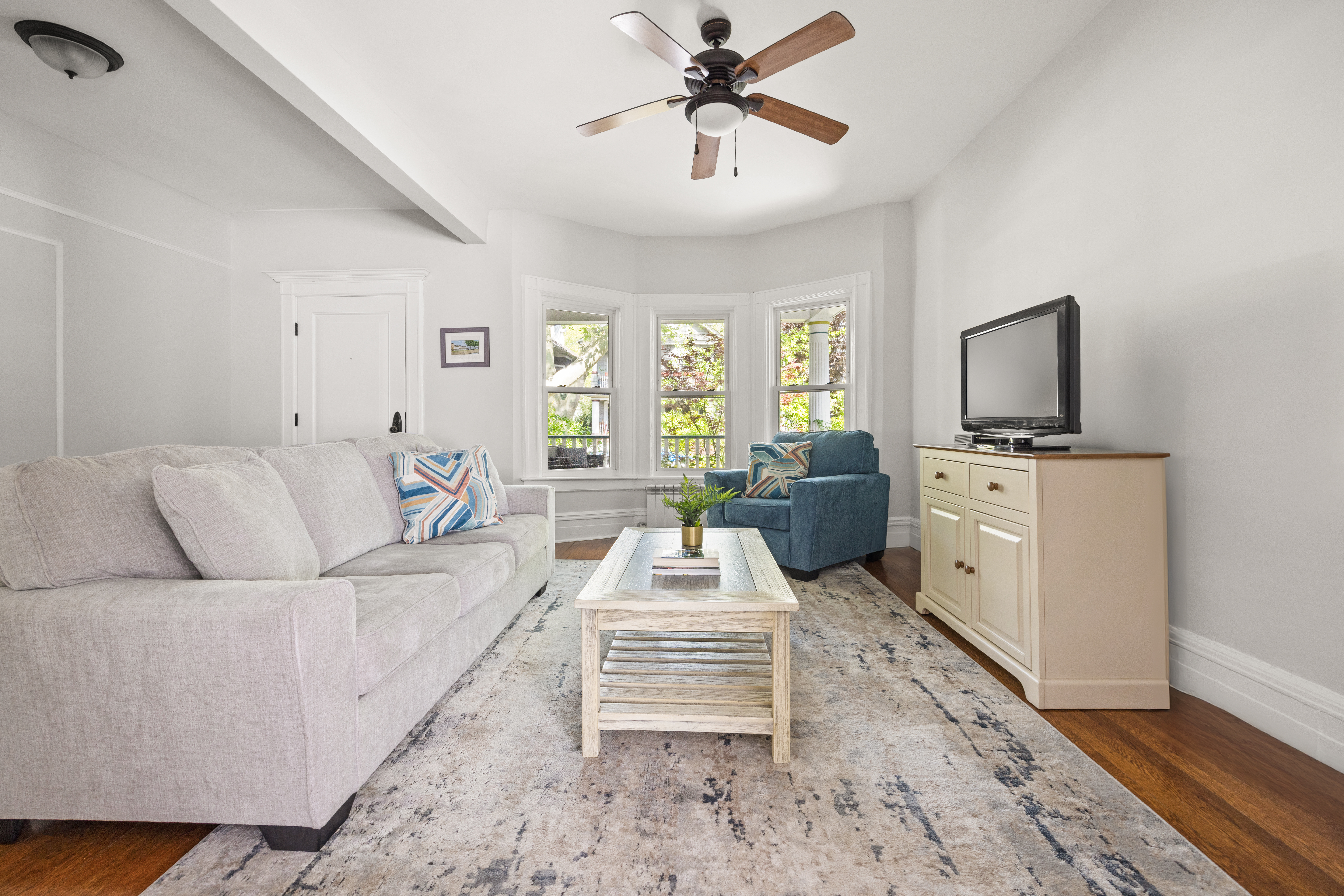 758 Westminster Road Brooklyn, NY 11230 - Photo 21 of 32 a living room with furniture and a flat screen tv