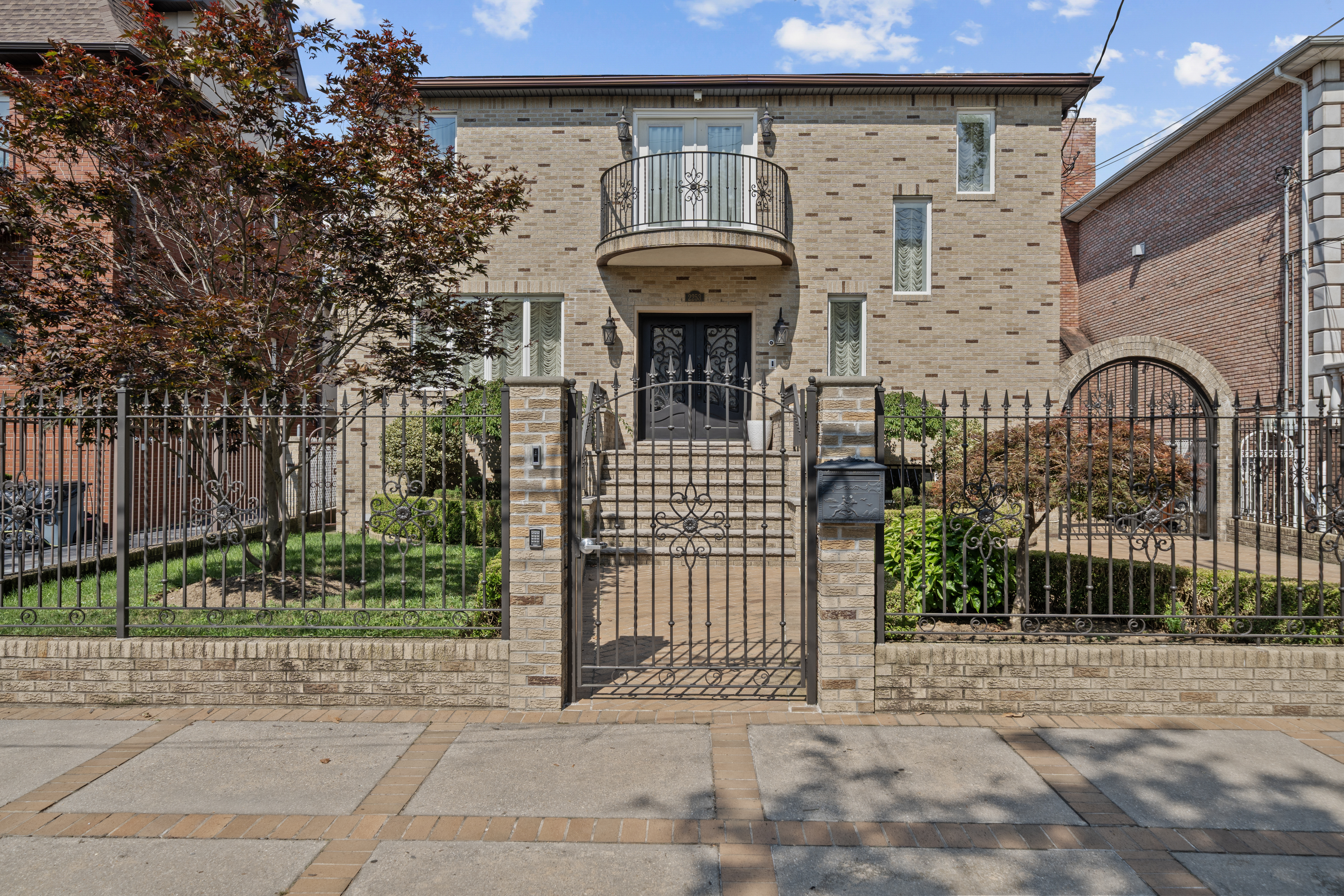 2253 East 64th Street Brooklyn, NY 11234 - Photo 2 of 45 a front view of a building with entryway