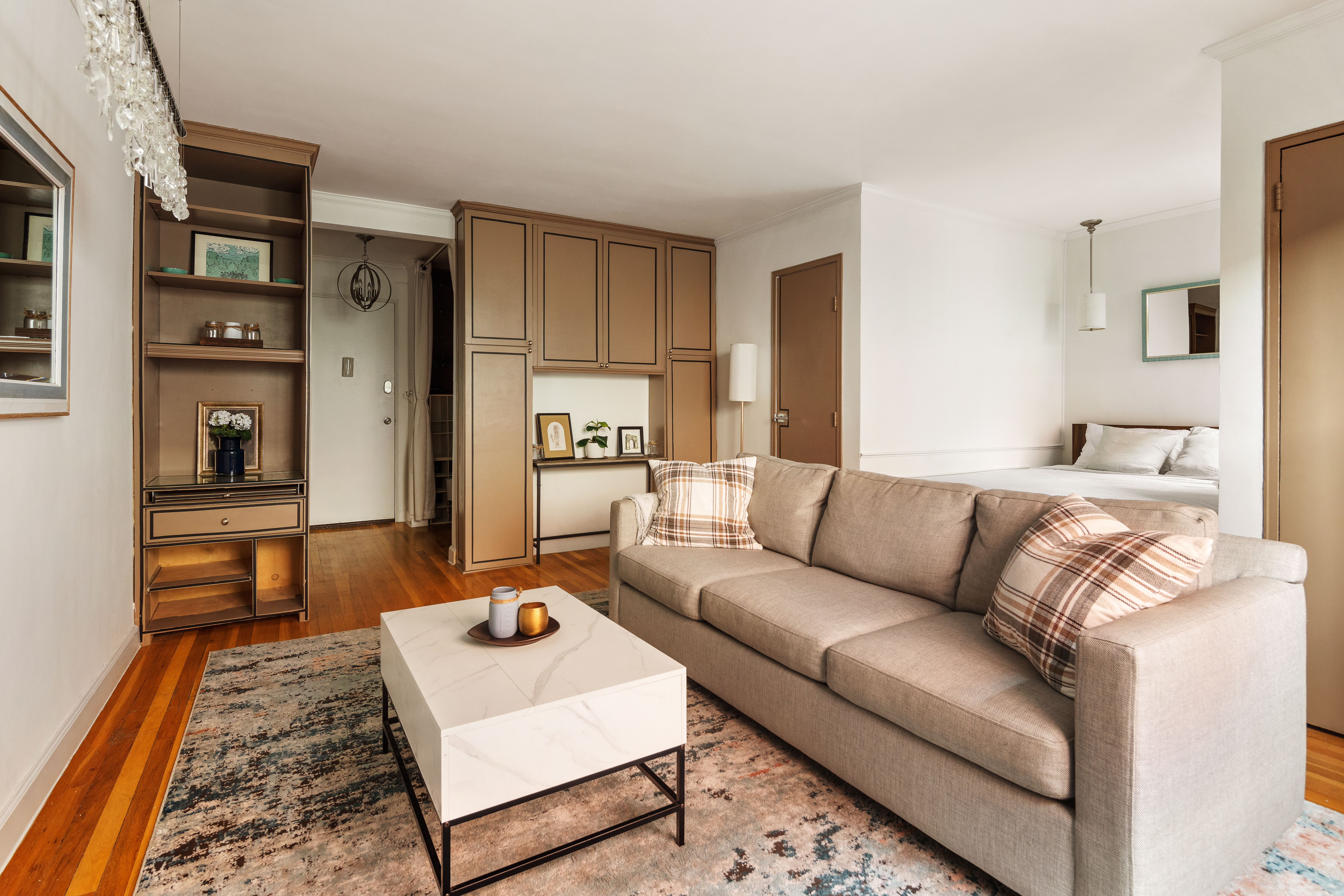 88 Bleecker Street, Unit 6A Manhattan, NY 10012 - Photo 2 of 7 a living room with furniture and a couch
