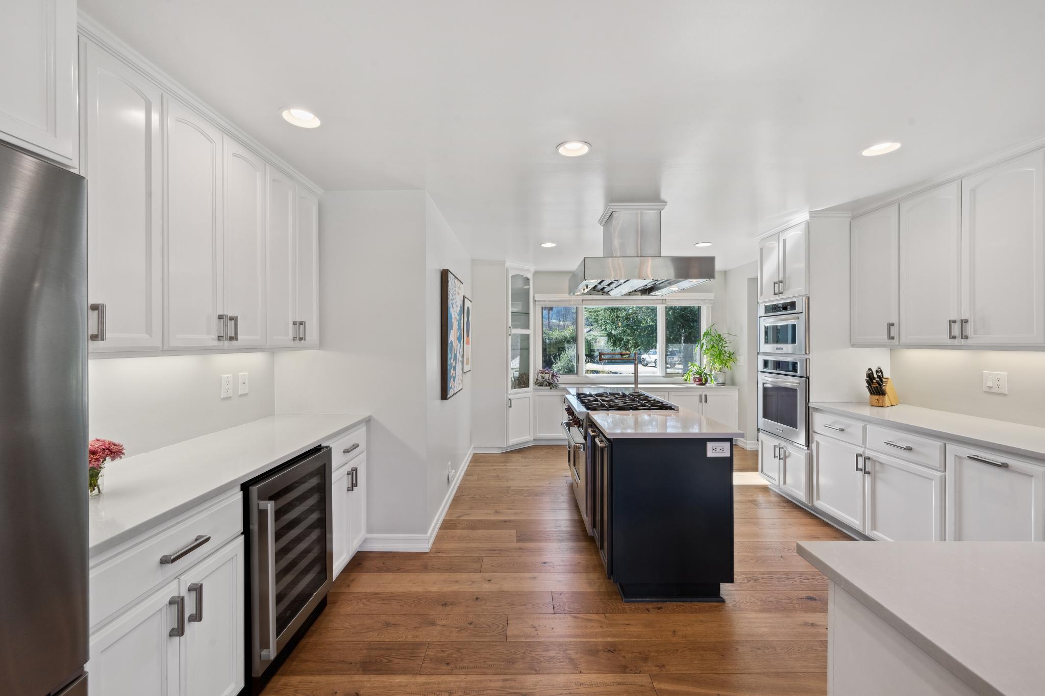 123 Frey Road Santa Rosa, CA 95409 - Photo 18 of 62 a kitchen with counter top space and wooden floor