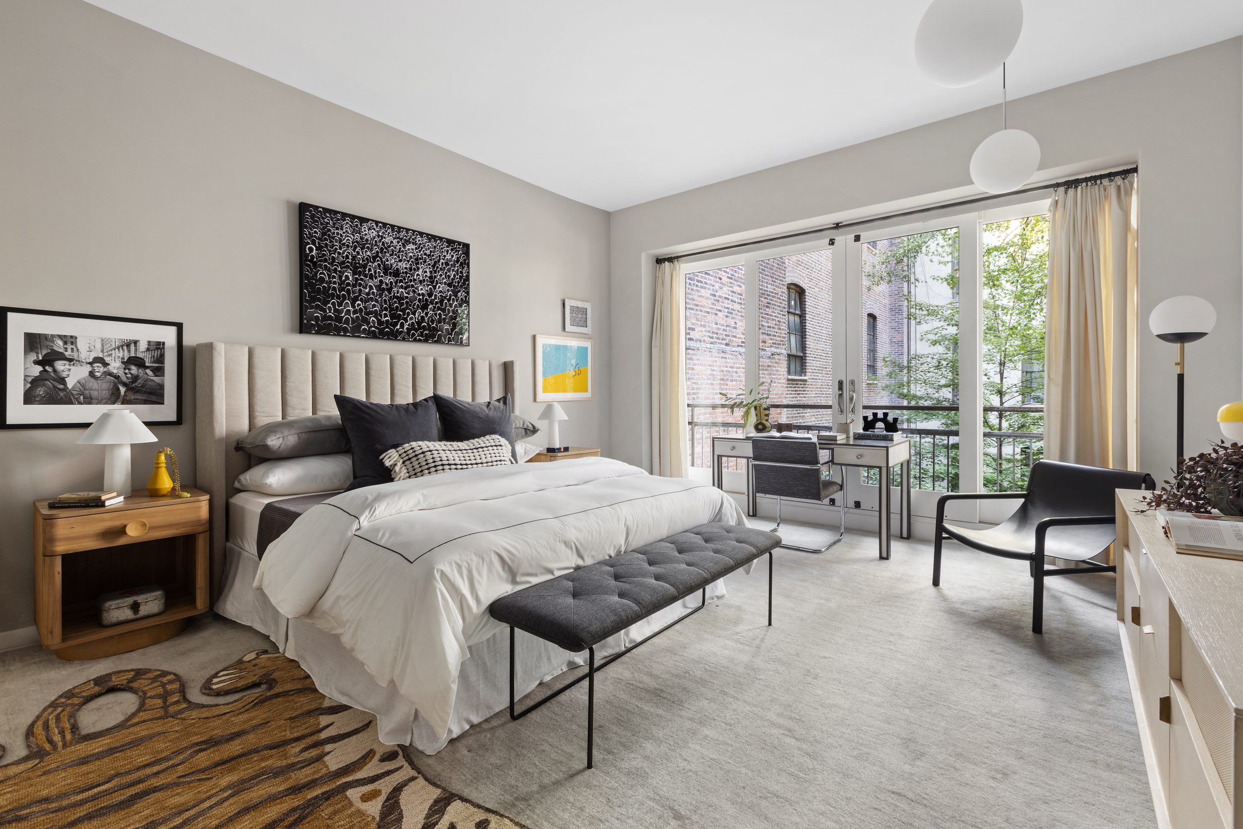 95 Charles Street, Unit TH Manhattan, NY 10014 - Photo 16 of 29 a bed room with a bed and a couch