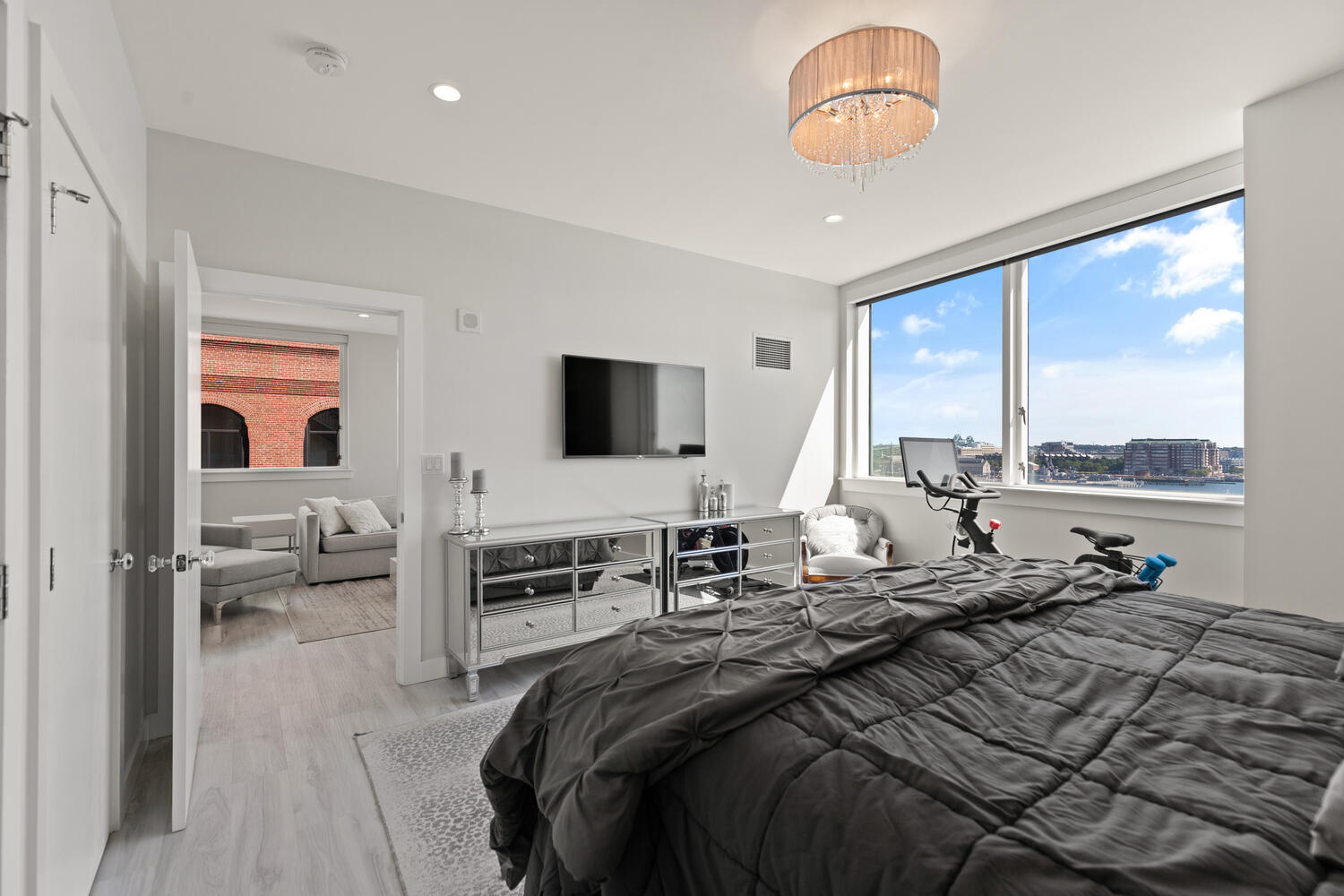 234 Causeway Street, Unit 709 Boston, MA 02114 - Photo 11 of 28 a bedroom with a bed and a flat screen tv