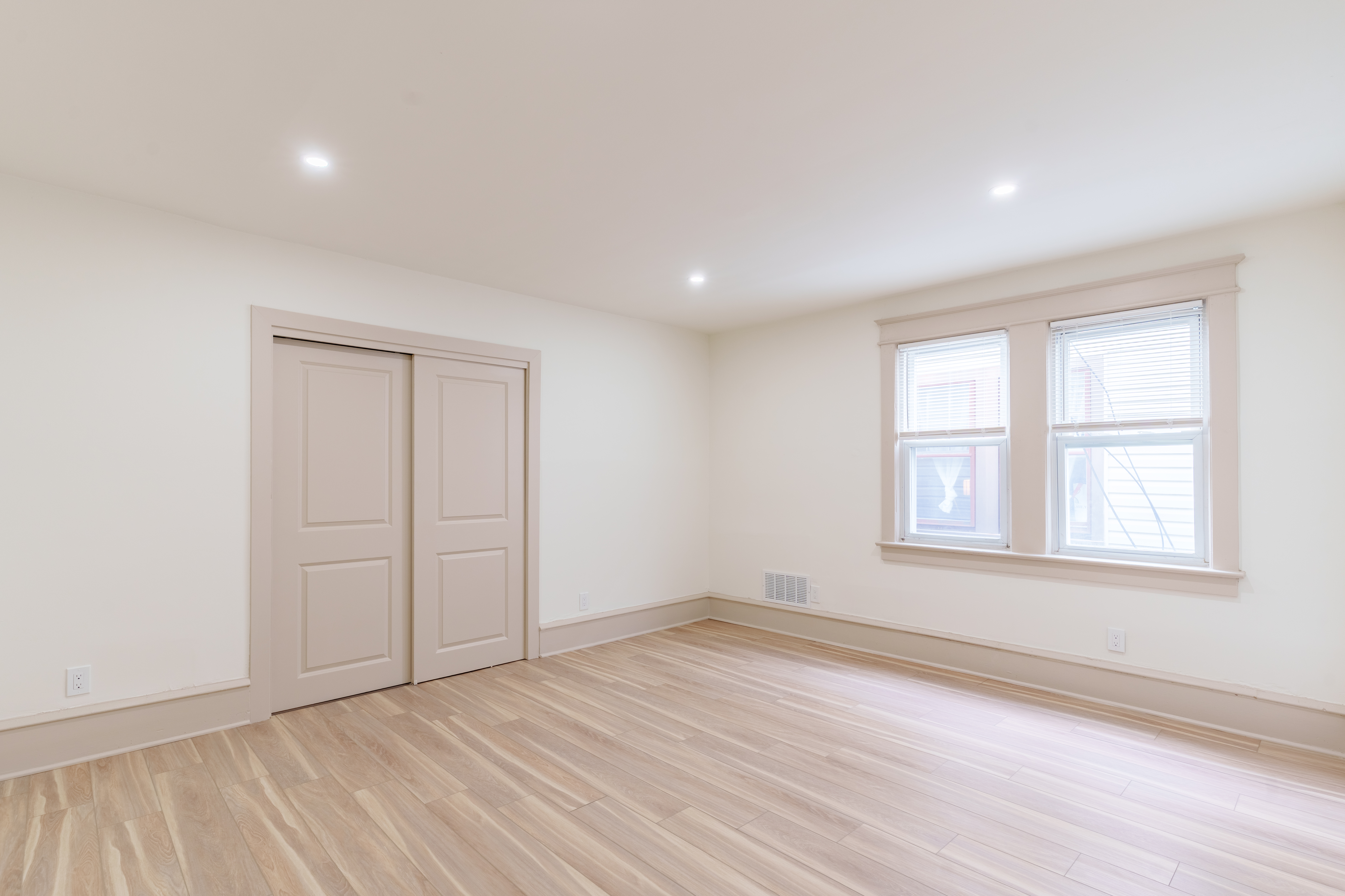 415 North Haddon Avenue Haddonfield, NJ 08033 - Photo 17 of 23 an empty room with wooden floor and windows